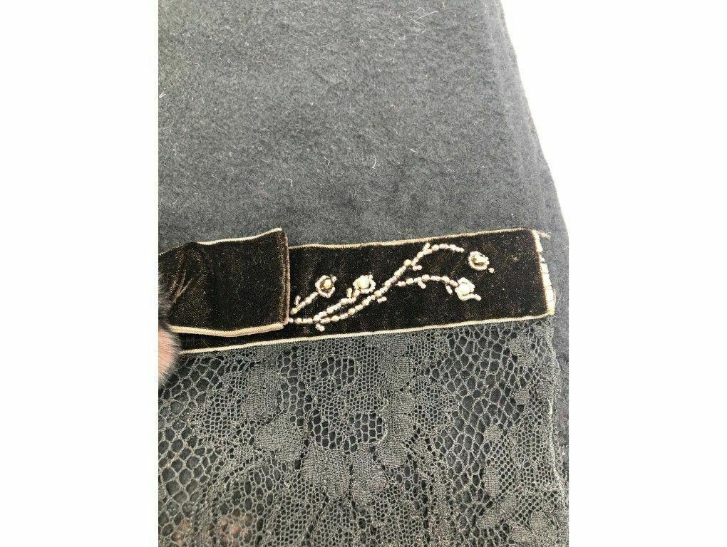 
BRAND	
Valentino

ACCESSORIES	
N/A

COLOUR	
Black

FEATURES	
Fur Flowers, Kashmir, Lace edged, Velvet strip

MEASUREMENTS	
76 inches x 28 inches

Related products
