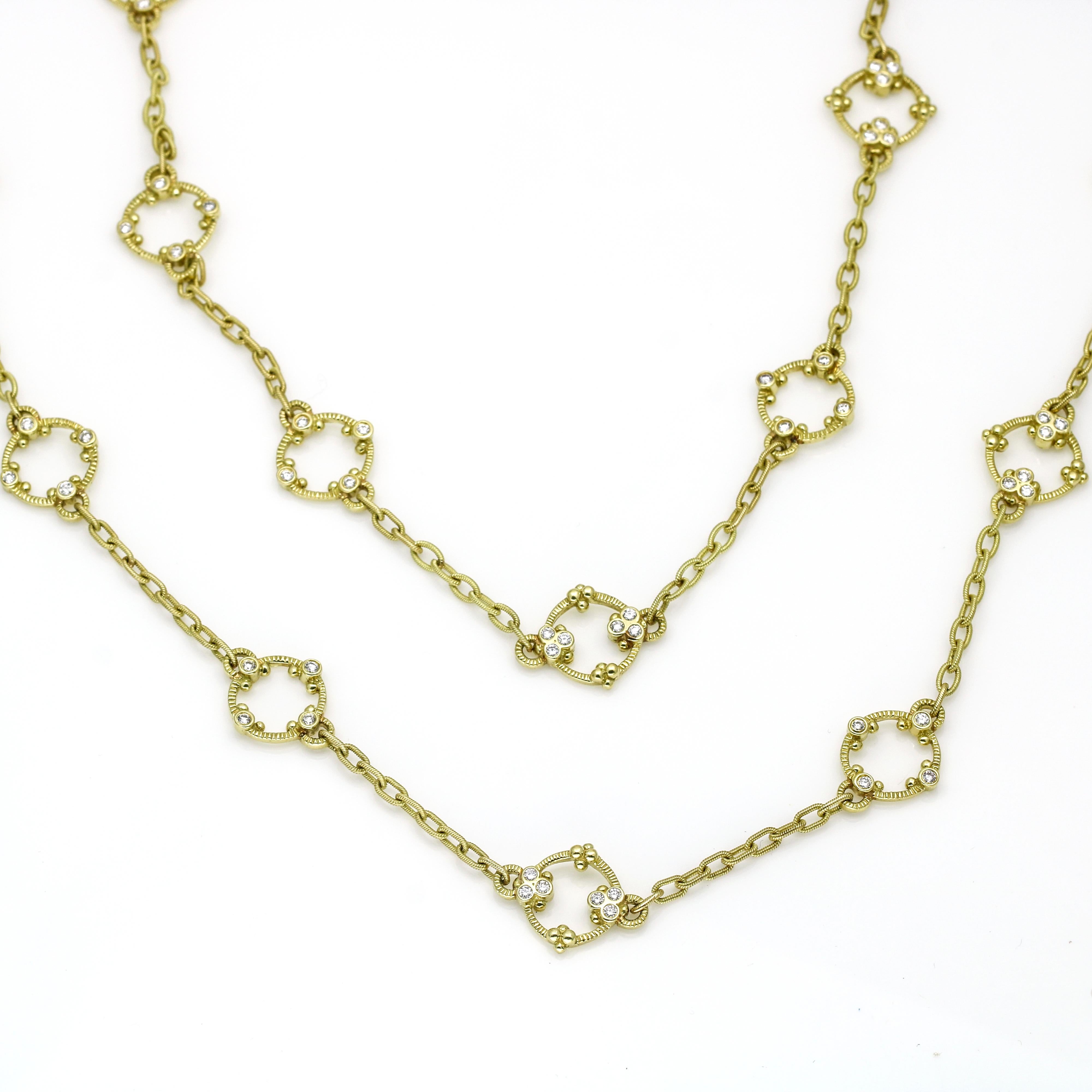Adorn yourself with elegance wearing the Women's Diamond Long Station Chain Necklace, beautifully crafted in radiant 18k yellow gold. This exquisite 36
