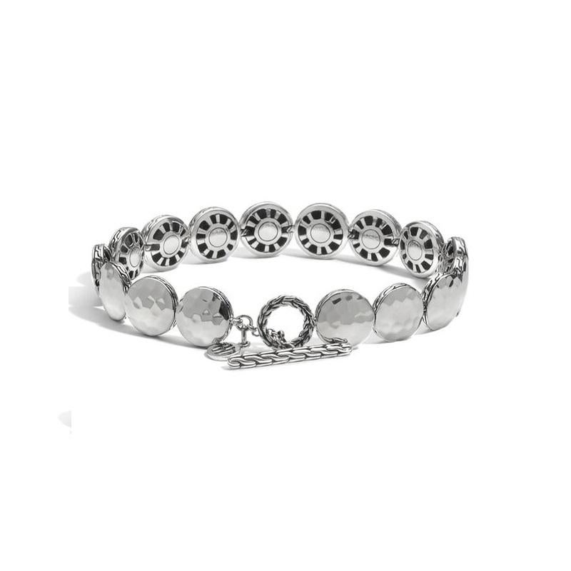 Women's Dot Hammered Silver Small Round Disc Bracelet with Toggle Clasp.
Sterling Silver
Bracelet measures 10.5mm wide
Toggle Clasp
Size Medium
BB7213XM
