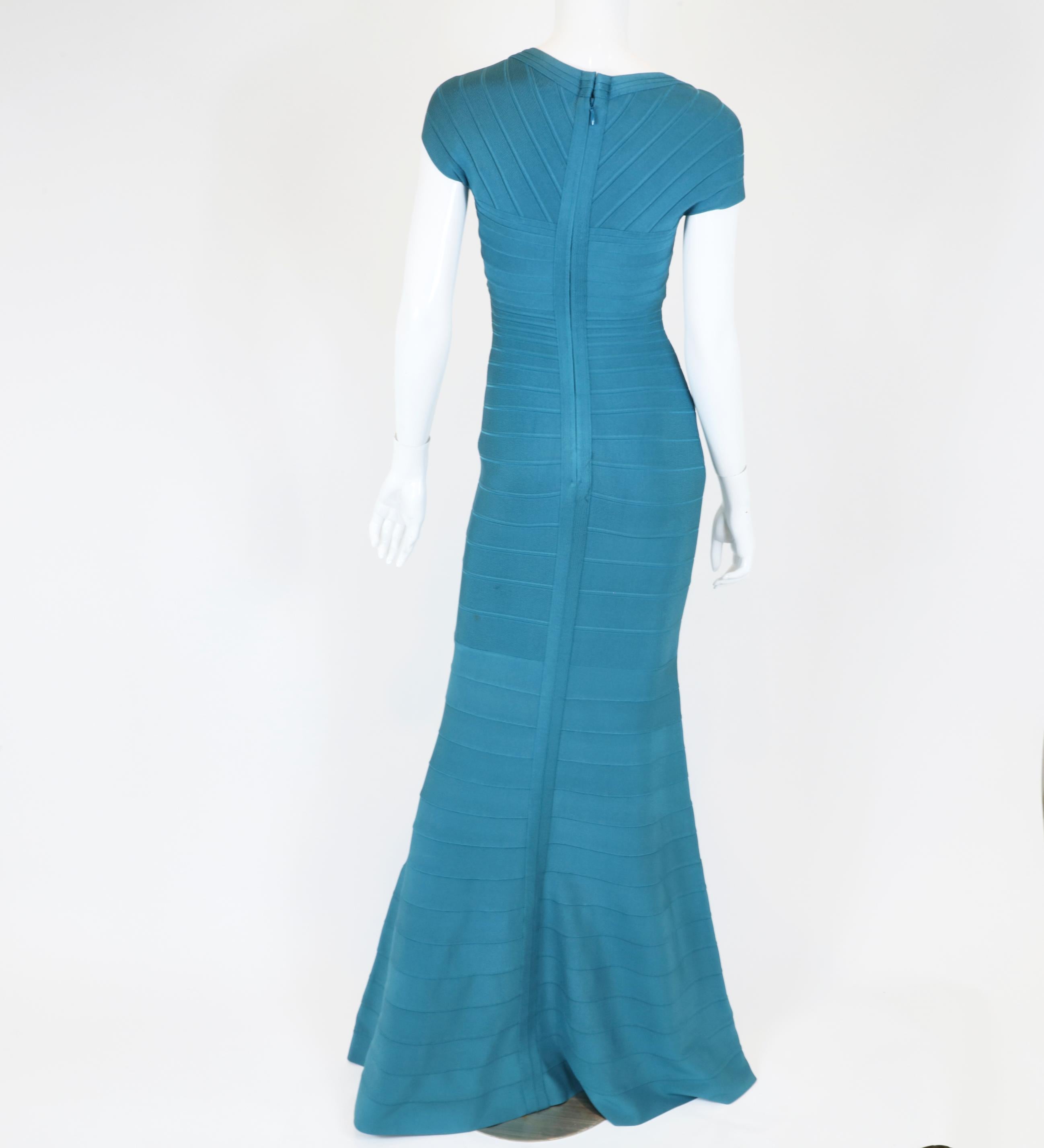 Women's Herve Leger Size XS Teal Dress
Short Sleeve Gown with Zipper in the Back

