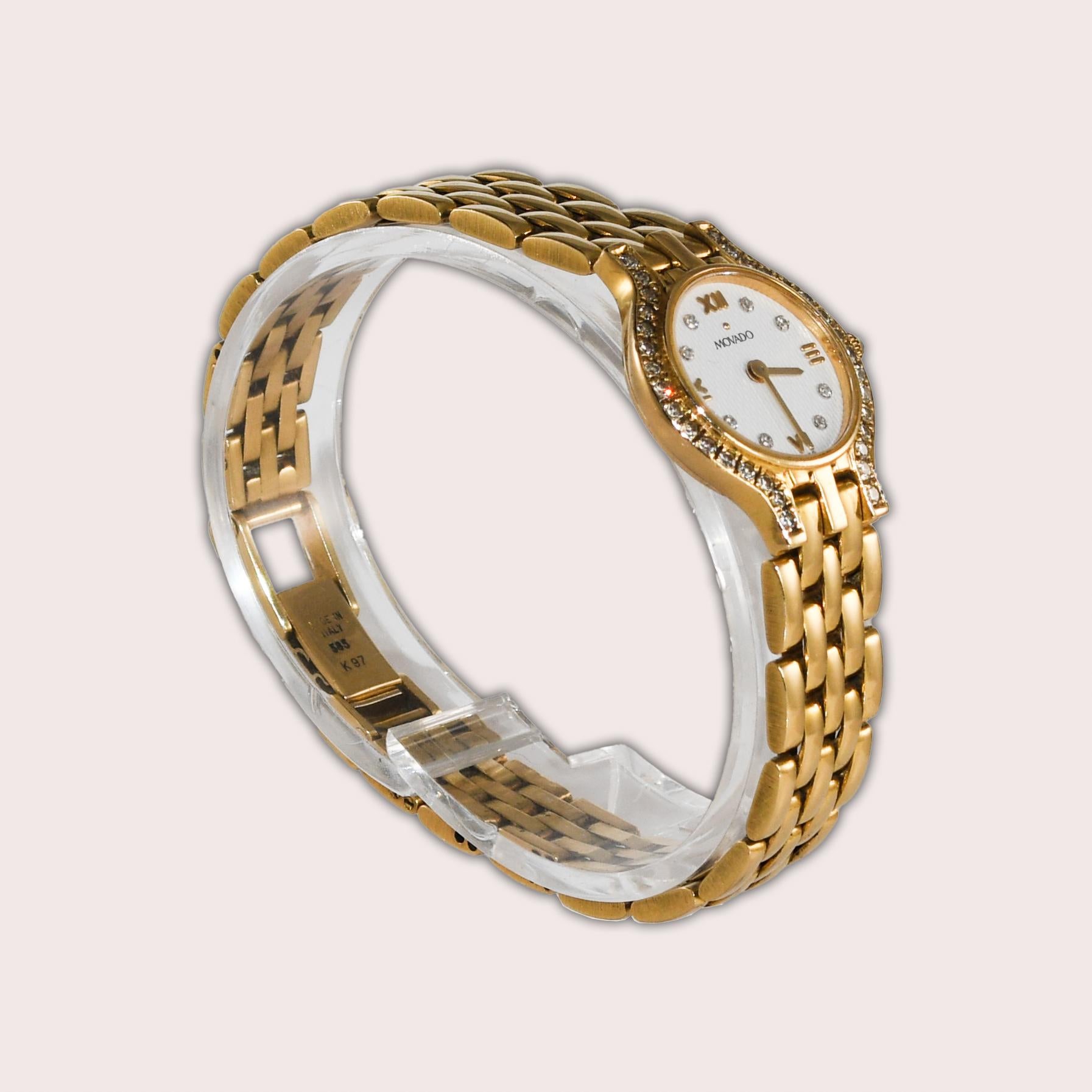 Ladies 14k yellow gold Movado watch with diamond bezel and dial.
Stamped 14k and the back case. 
The case size is 20mm wide. 
The gross weight is 33 grams.
The quartz movement has a new battery and keeps good time.
Single-cut diamonds on the bezel
