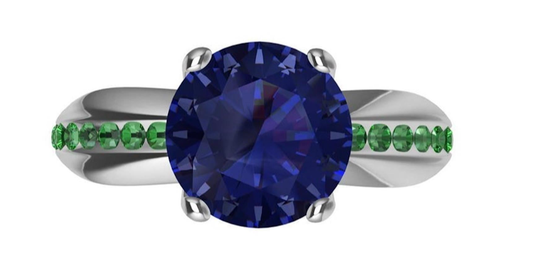 Contemporary Womens Platinum 1.55 Carat Blue Sapphire and Tsavorites Cocktail Ring For Sale