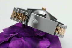 Women's Rolex Datejust Diamond Bezel with Rubies White Roman Dial Watch