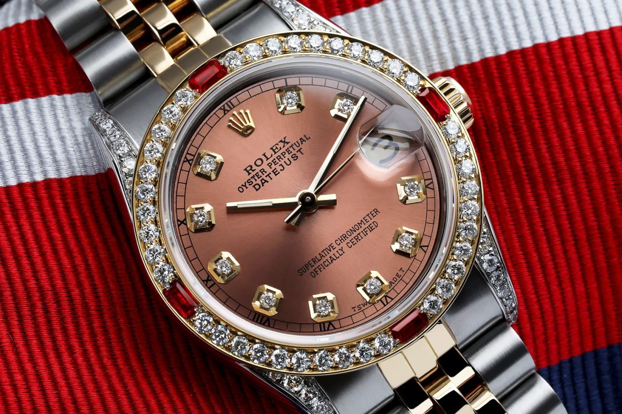 Women's Rolex 31mm Datejust Two Tone Jubilee Salmon Color Dial Diamond Accent RT Bezel + Lugs + Rubies Watch 68273

This watch is in like new condition. It has been polished, serviced and has no visible scratches or blemishes. All our watches come