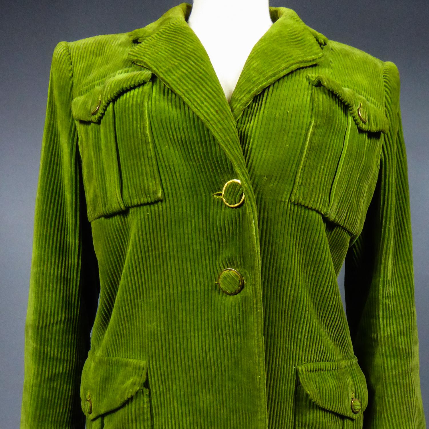 Summer Collection 1947
France

Rare women's sports jacket (Golf, riding or winter sport?) in olive-green corduroy with broad shoulder pads and signed Jeanne Lanvin, Haute Couture, summer collection 1947. Men's wardrobe inspiration for this