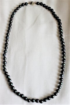 Women's Tahitian Black Pearl Necklace with a 14 Karat Gold Ball Clasp