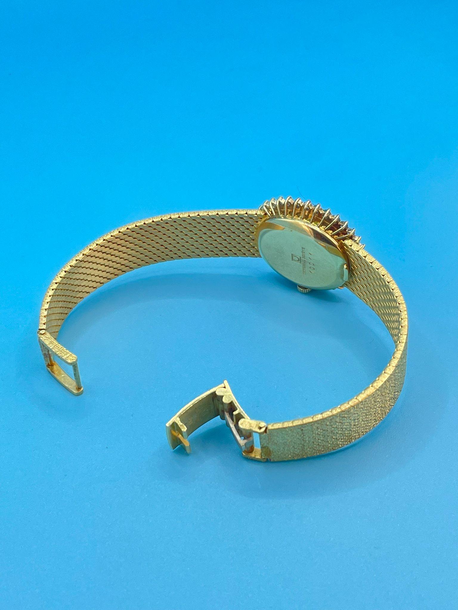 Reloj de señora de oro de 18 quilates y diamantes naturales 