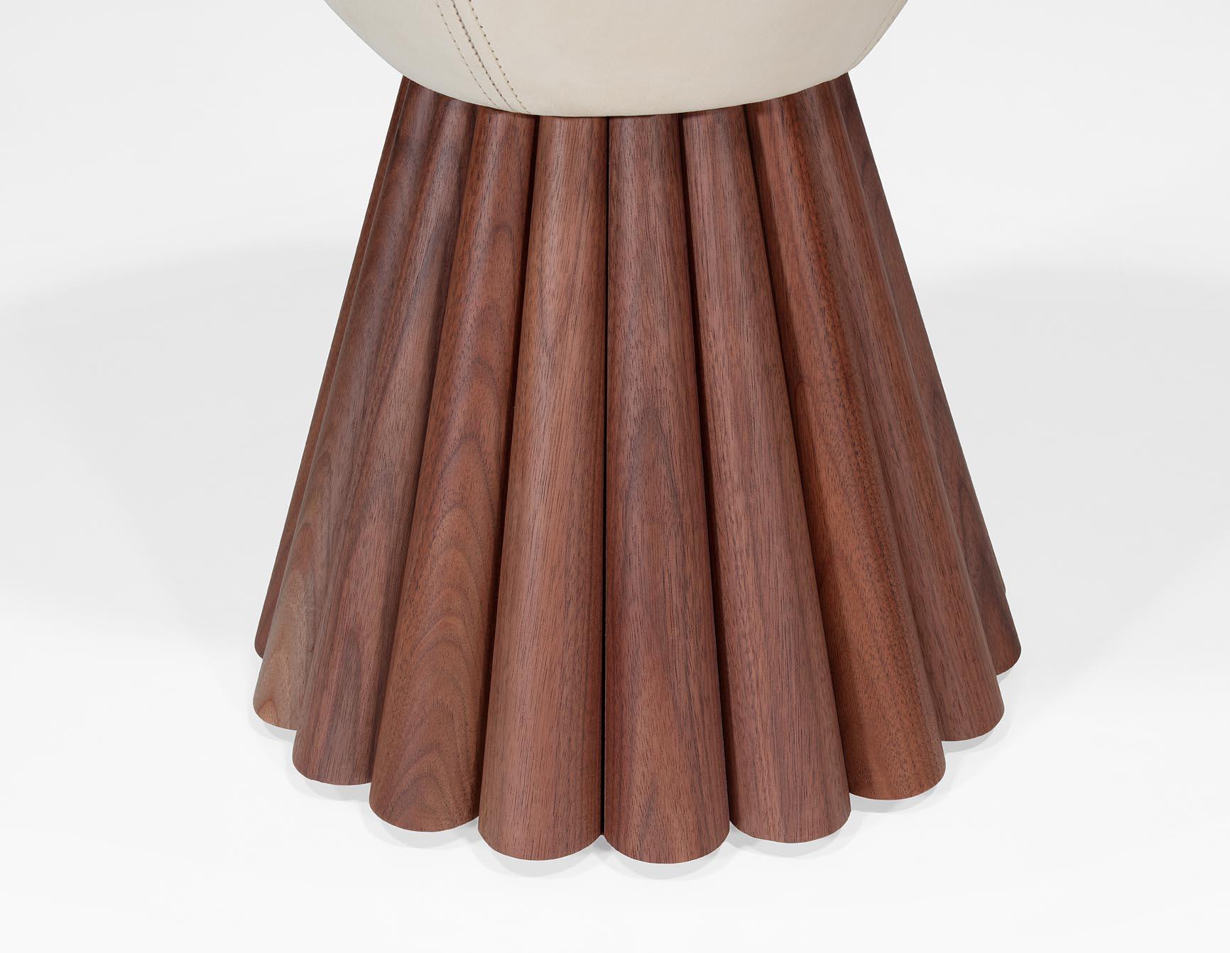 A true statement of luxury
Combining the finest and ancient craftsmanship with luxurious levels of design, quality, and comfort. 

Al-Shaykh Stool, Modern Collection, Walnut Wood, Suede Fabric - Traditional Handcrafted in Portugal 

It is made