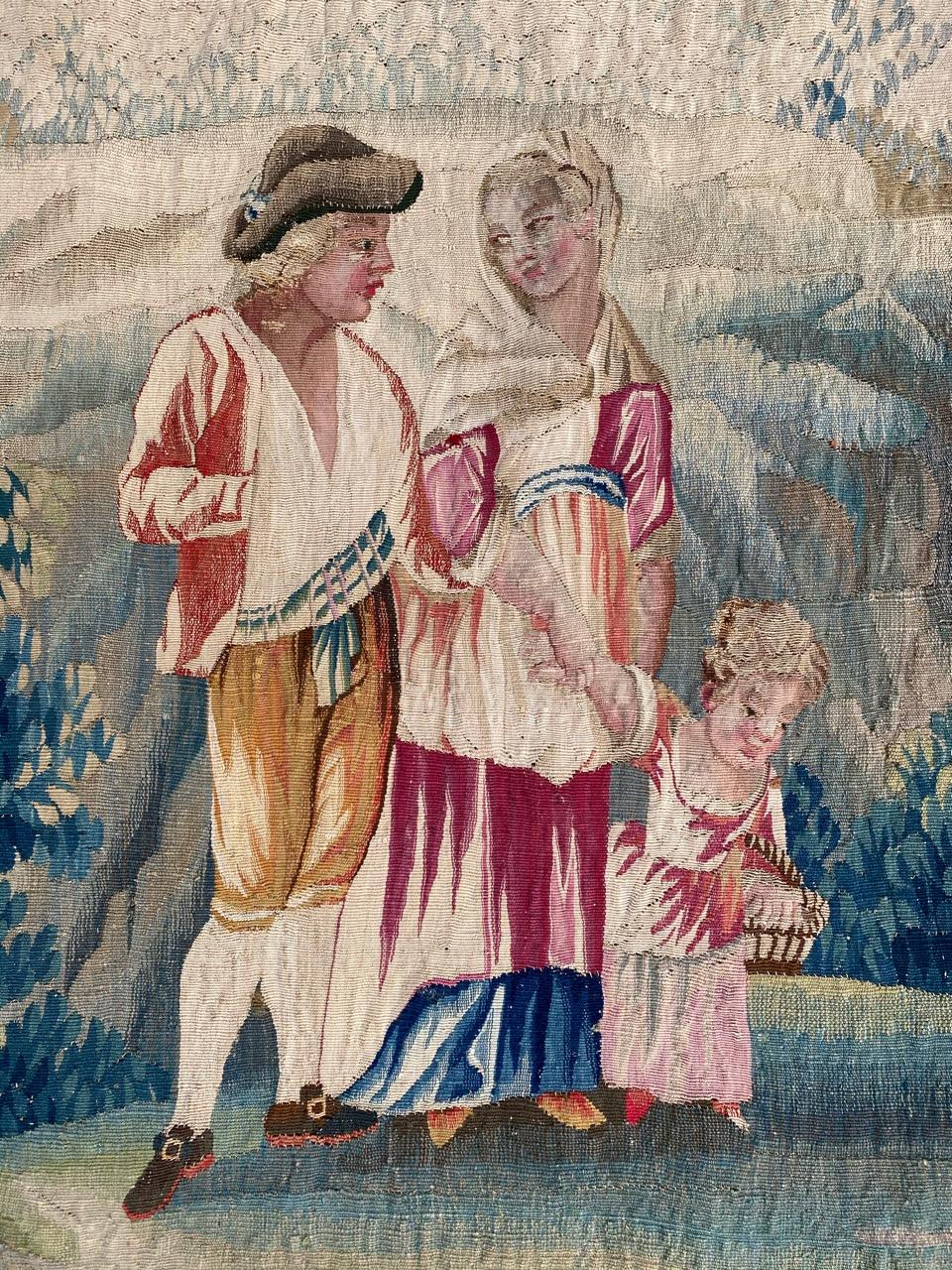 Very beautiful French Aubusson tapestry from 18th century with a nice design showing a family in the countryside and with beautiful colors, entirely and finely handwoven with wool and silk.