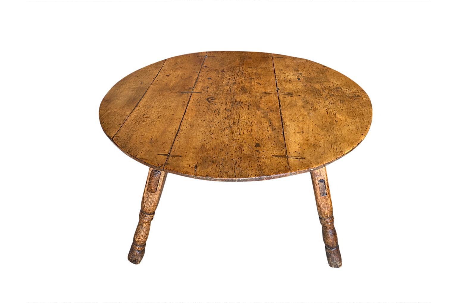 A truly outstanding 18th century Table Vigneron - Wine Tasting Table from Switzerland.  Beautifully constructed from richly stained beech and pine with wonderful tilting top and wonderfully shaped legs.  Excellent patina.