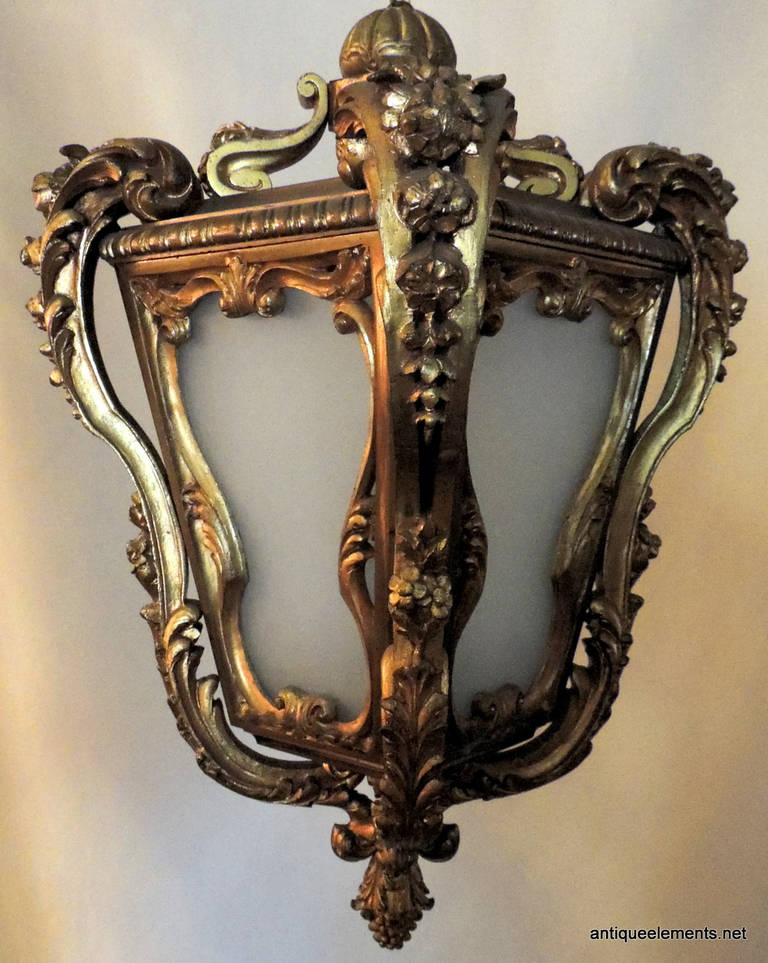This wonderful early 20th century dore bronze lantern by E. F. Caldwell in the French style with original frosted glass is a beautiful addition to your entry way. The bronze work is embellished on all four corners with floral and leaf filigree and
