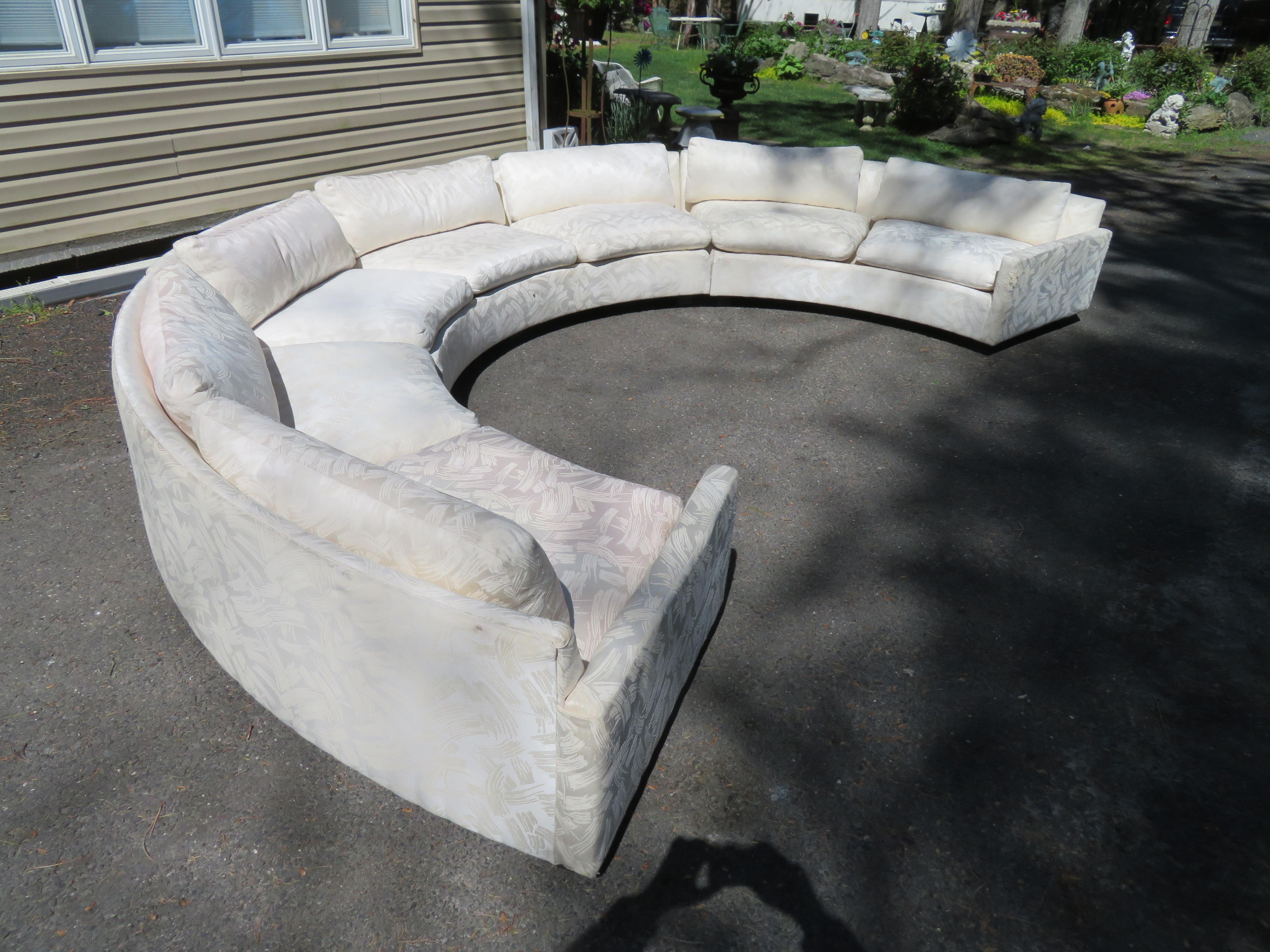 Wonderful 3 Piece Milo Baughman circular sectional sofa. We love these large circular sofas by Milo Baughman. This one features 2 armed sections measuring 24