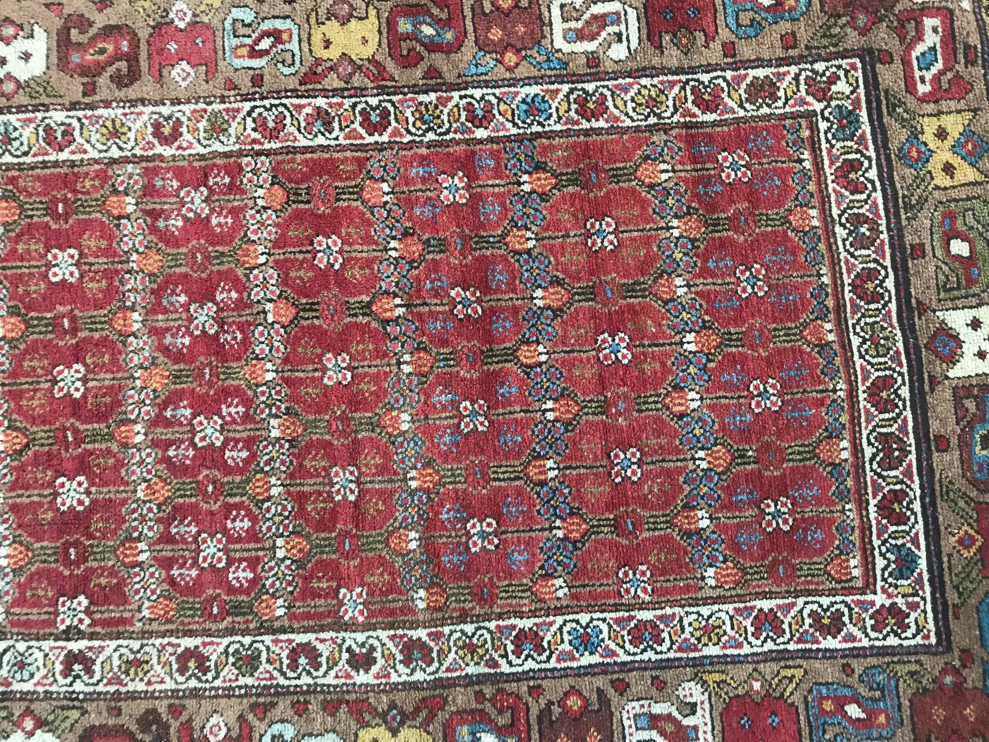 Nice antique runner late 19th century with beautiful decorative and tribal design and natural colors with orange, yellow, blue and green Kurdish north eastern rug. Entirely hand knotted with wool velvet on wool foundation.