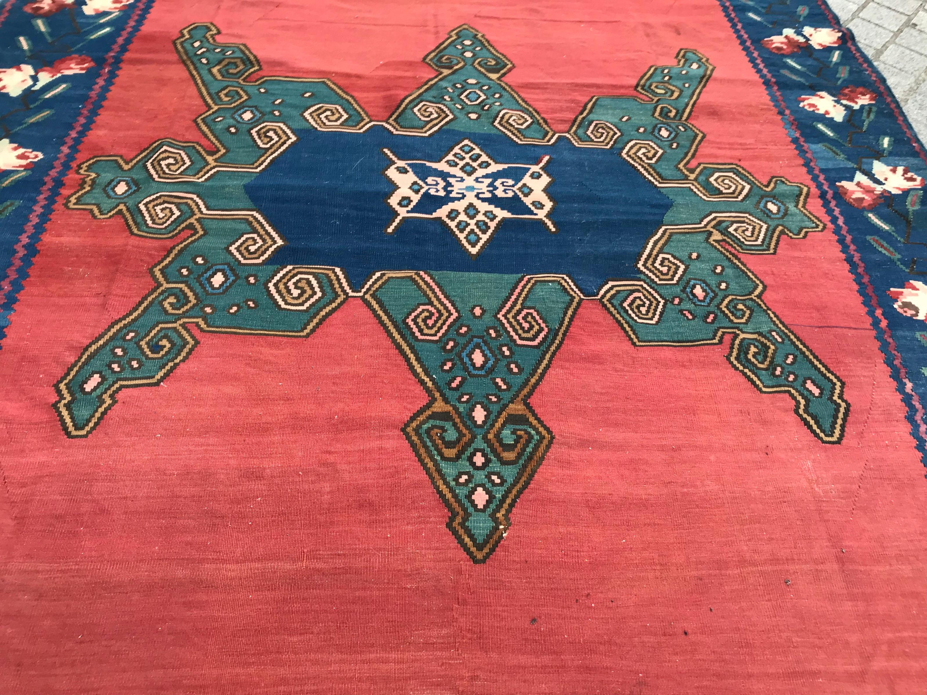 Very beautiful mid-20th century Caucasian Karabagh Kilim with beautiful Caucasian geometrical design in center and a Aubusson floral design at borders, and with natural colors with blue, green and red, entirely handwoven with wool on wool foundation.
