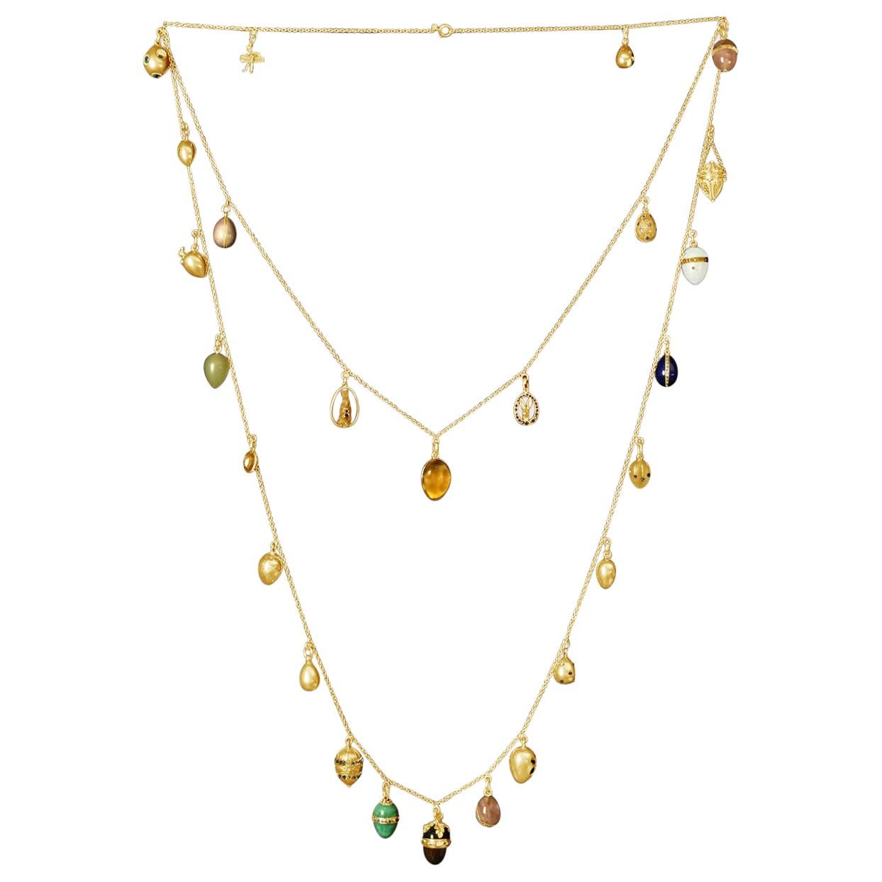 Wonderful Antique Collection of Egg Pendants Suspended from a Gold Necklace