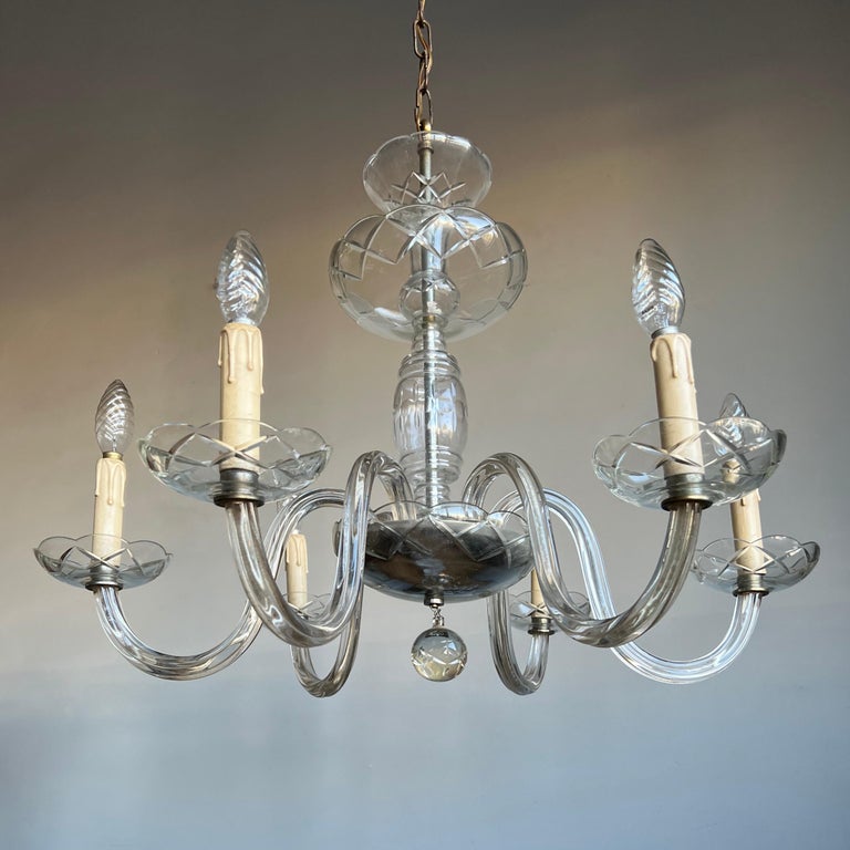 Remarkable workmanship, mouthblown art glass chandelier.

If you are looking for a special light fixture to grace your living space then this handcrafted chandelier from the land of art glass could be flying your way soon. Even by looking at our