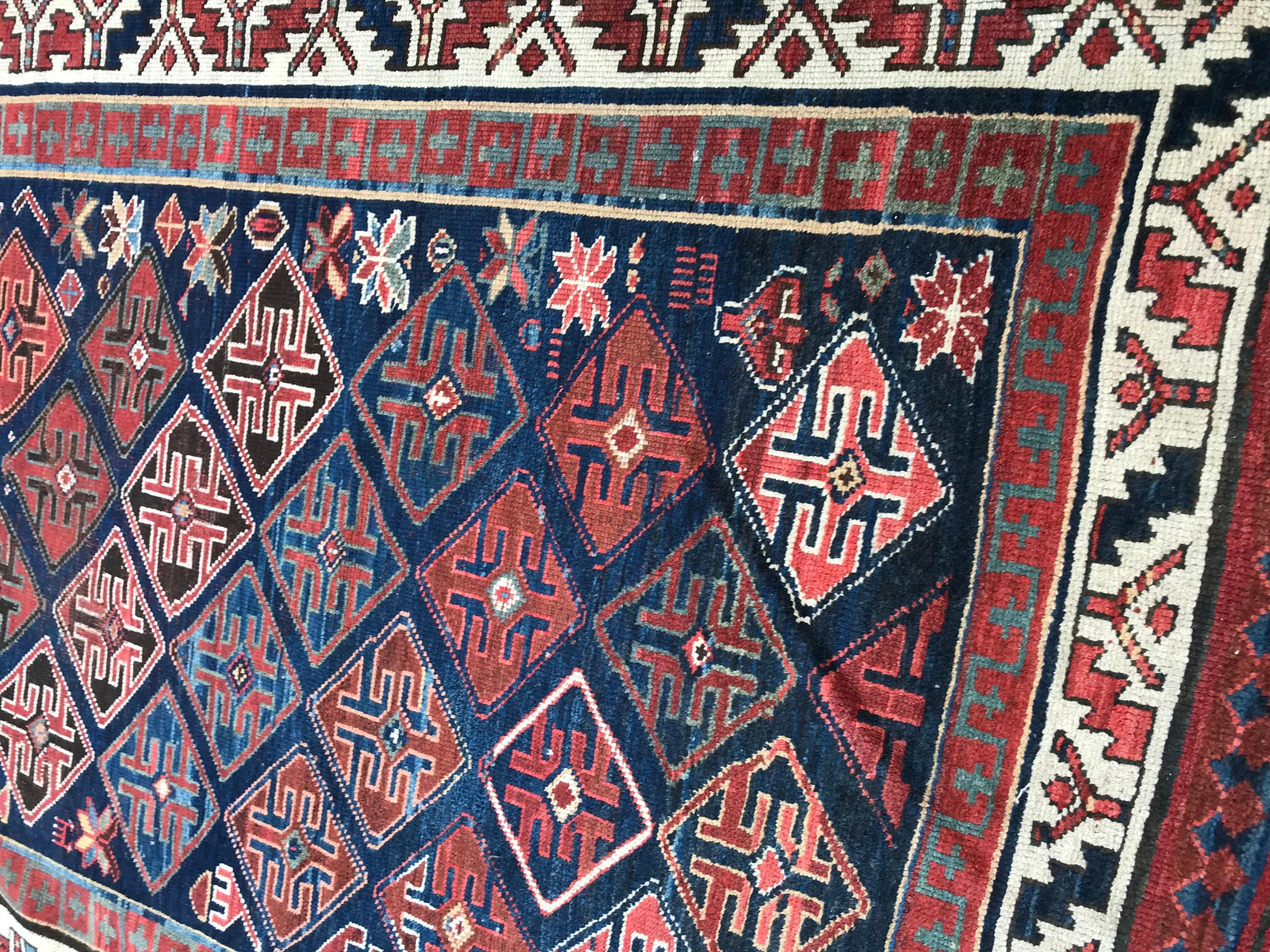 Nice late 19th century long Caucasian rug with natural colors and a beautiful tribal geometrical design. Entirely hand knotted with wool velvet on wool foundation.

✨✨✨
