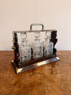 Wonderful antique oak three bottle tantalus