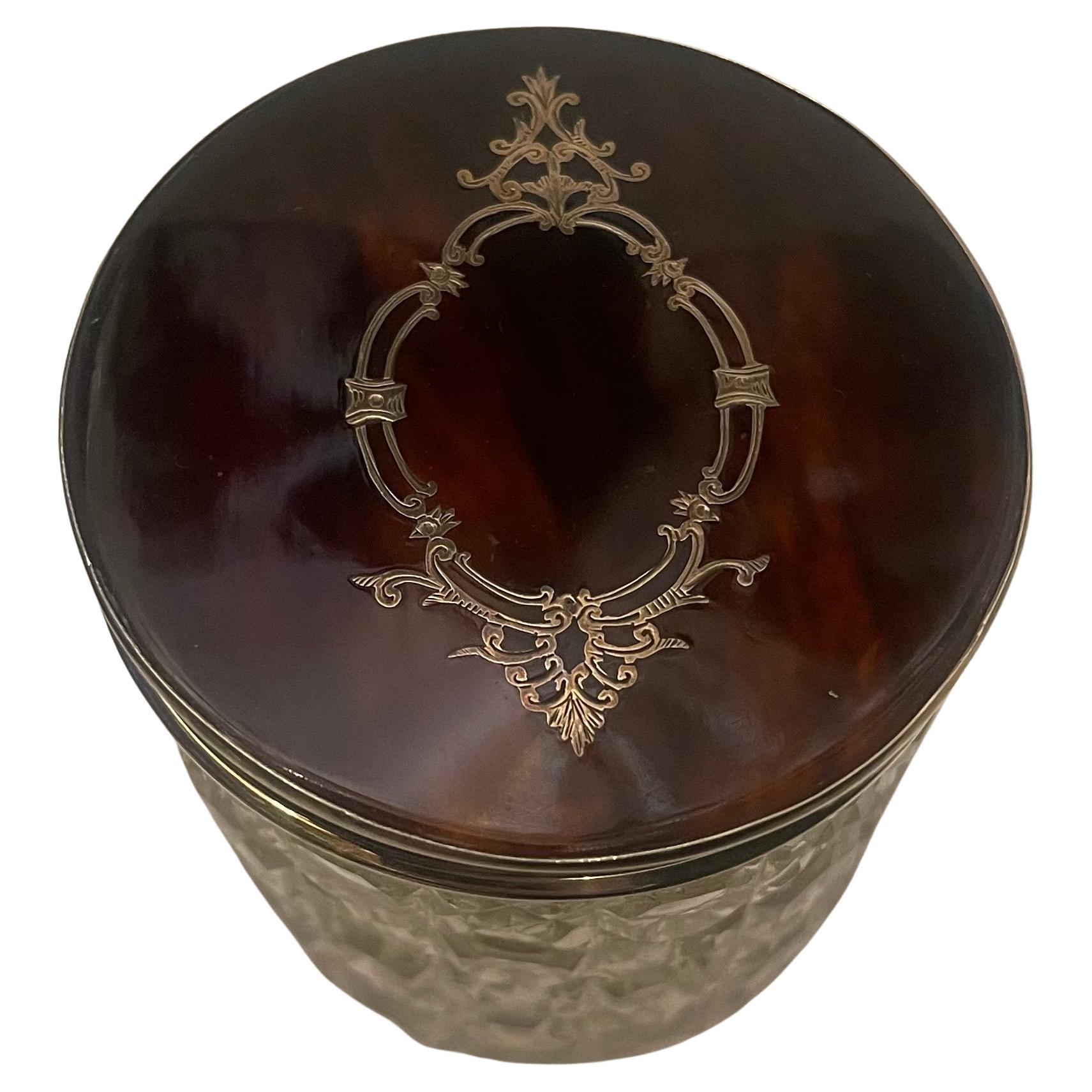 A Wonderful Round Sterling Silver And Tortoise Shell Vanity Powder / Trinket Box Or Jar. The Sterling Silver Top Having A Tortoise Shell Pique Inlaid With Removable Lid With English Silver Marks. The Clear Cut Crystal Bottle Has Been Beautifully