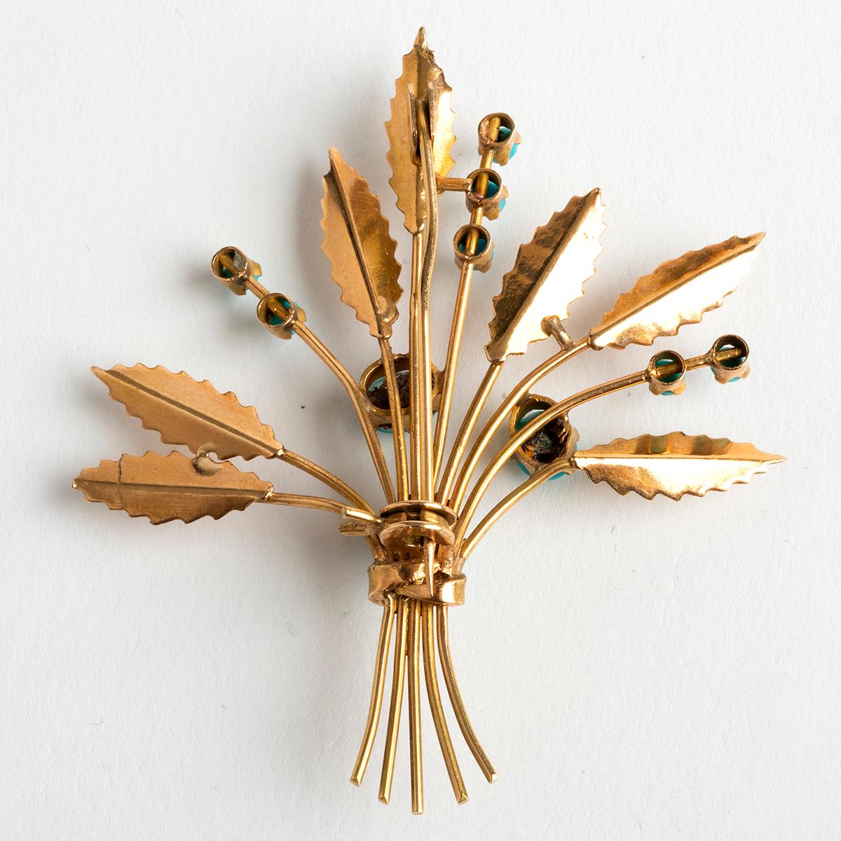 A unique piece within our carefully curated Vintage & Prestige fine jewellery collection, we are delighted to present the following:

Our wonderful antique gold brooch of 15carat yellow gold in the shape of a floral spray / display features 12