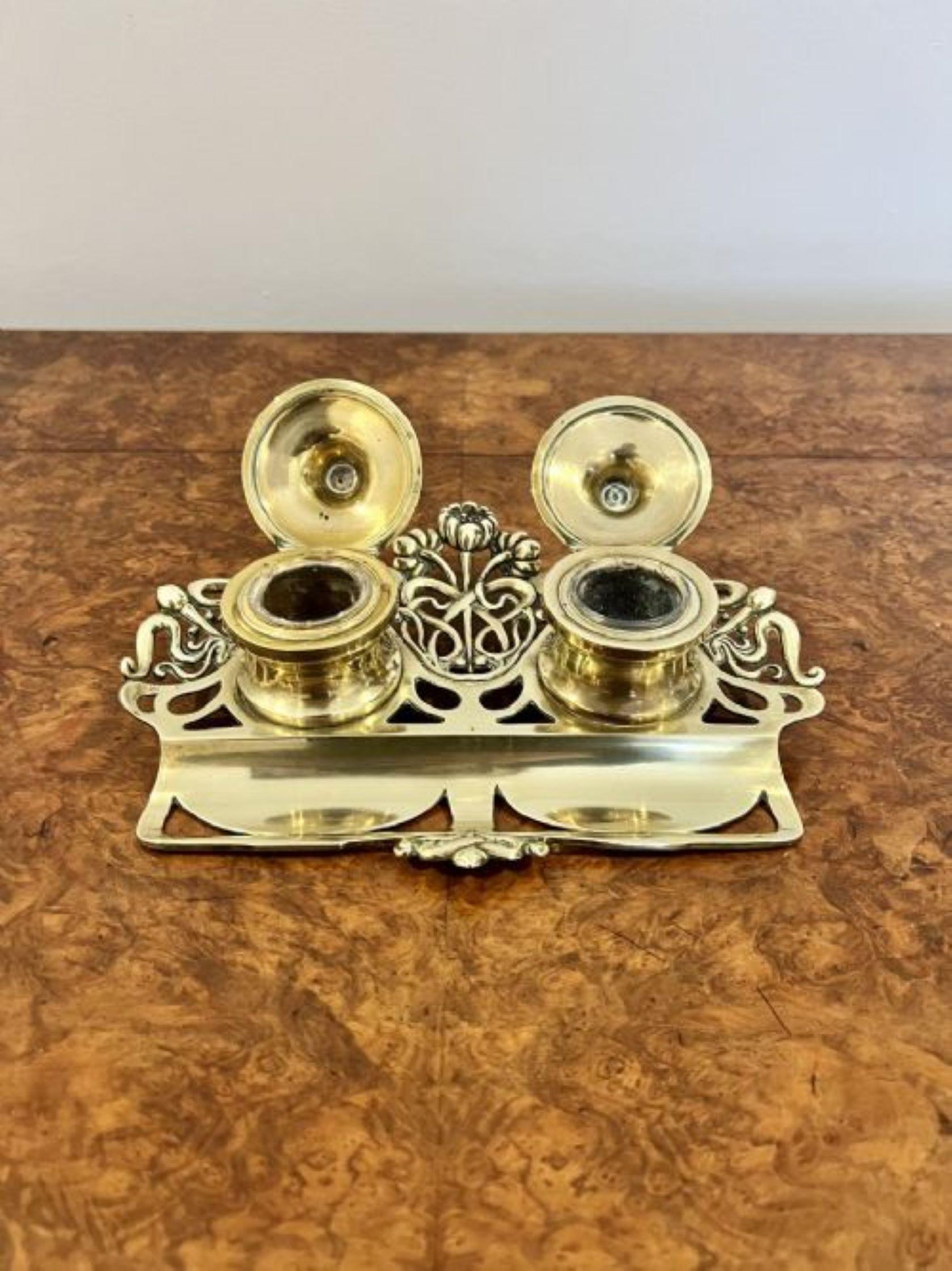 Wonderful antique Victorian ornate brass desk set having a quality ornate brass ink stand with a tray to the front, wonderful ornate detail with two brass ink wells with lift up lids opening to reveal two glass removable ink wells. 
