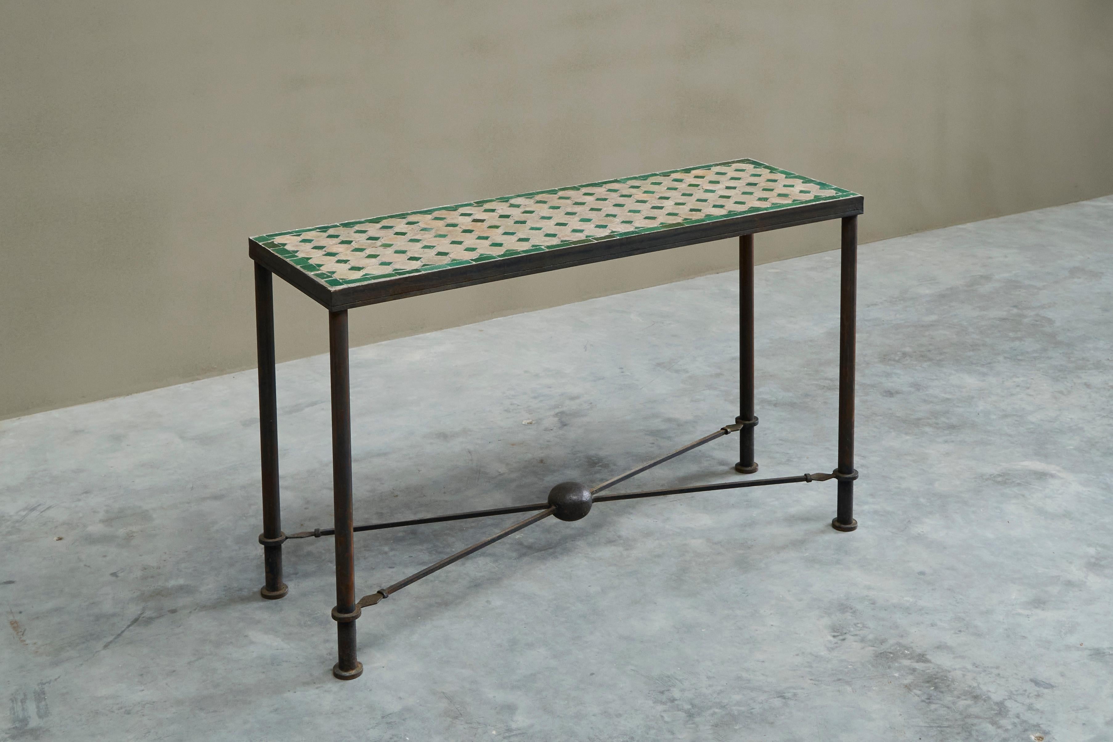 Wonderful Art Deco Console Table in Patinated Iron and Tiles 1940s.

A stunning and rare art deco console or hall table in patinated iron and tiles. Probably French or Belgian, 1930s - 1940s. Resembles works by Jean-Michel Frank and Diego