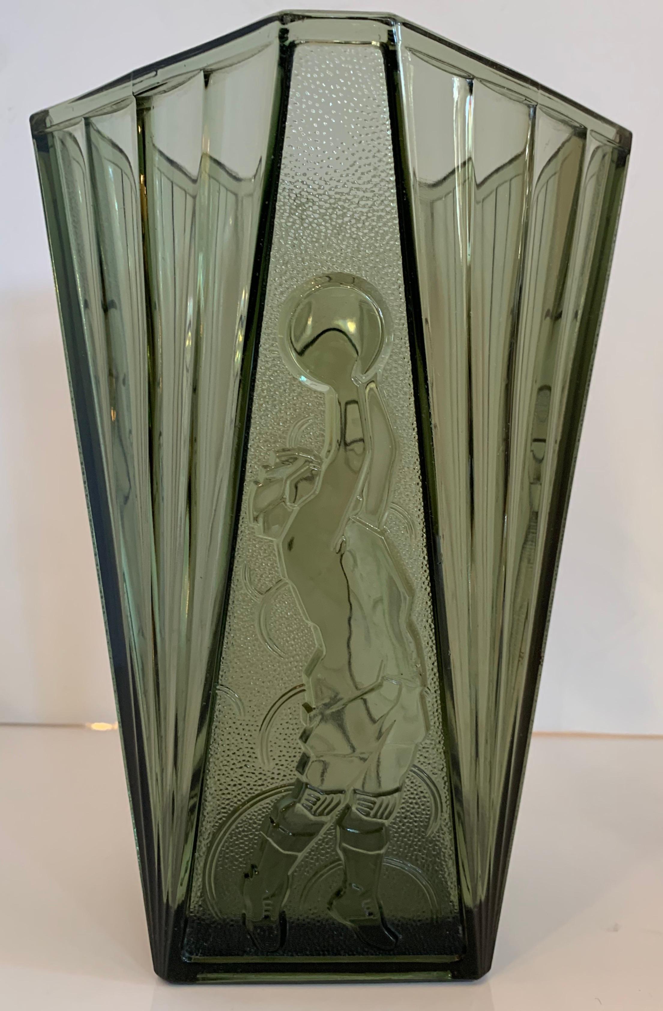A wonderful Art Deco Val Saint Lambert crystal vase Luxval edition green tone vase of a basketball player.