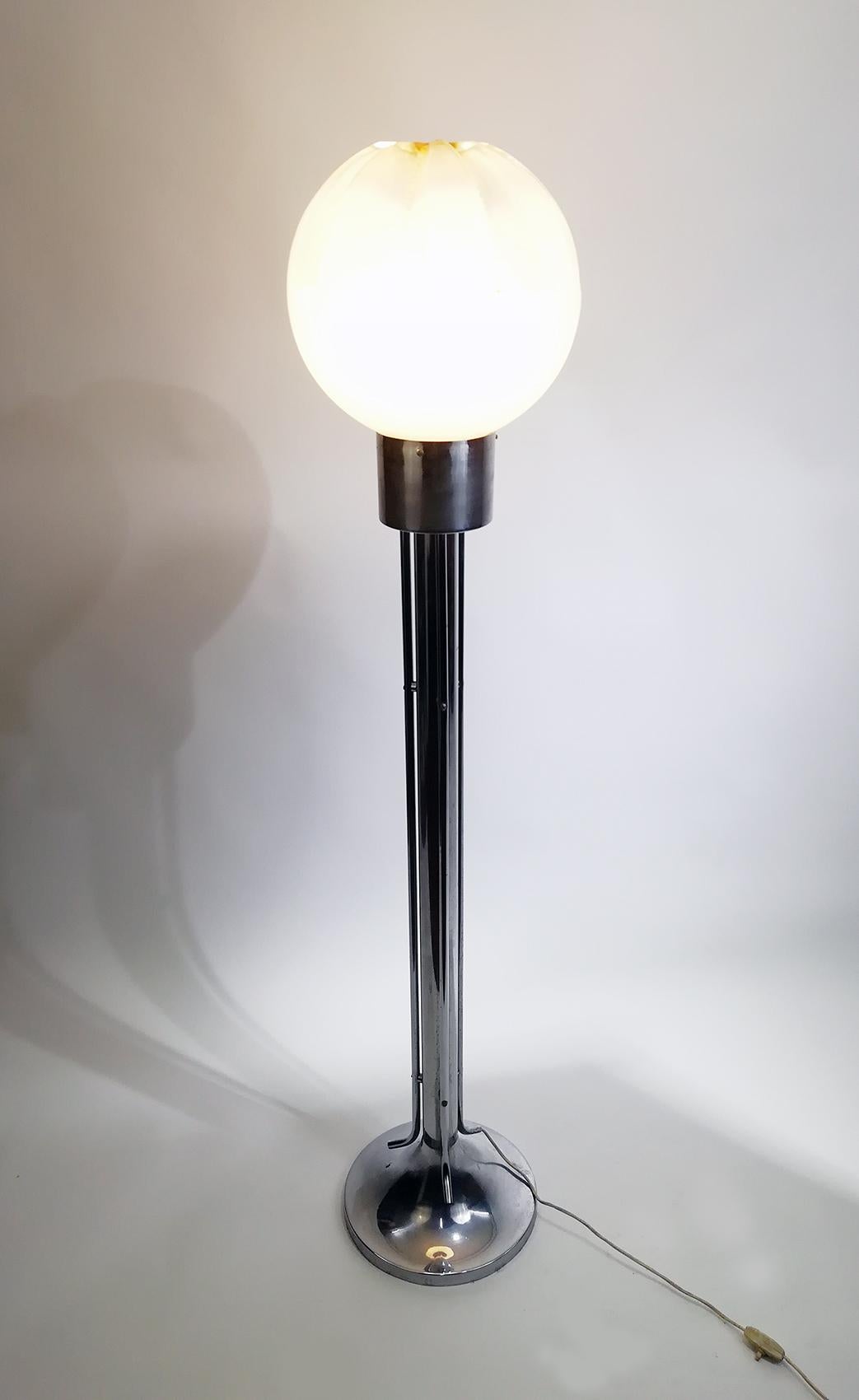 Sublime floor lamp made by A.V. Mazzega with very impressive colored large blown glass bowl and a chromed steel base.
This floor lamp has beautiful light effect when lit.
Manufactured in the early 1970s.
Dimensions: H=144 cm Ø base = 30 cm
It