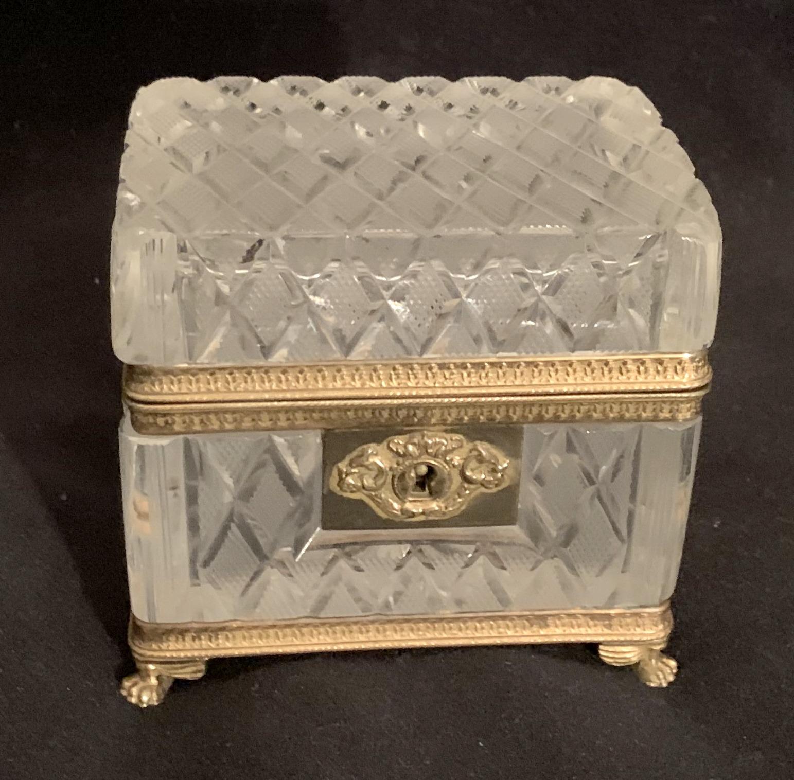 A wonderful French ormolu-mounted faceted or cut crystal box, casket, jewelry case standing on winged feet, in the manner of baccarat.
Stamped made in France.