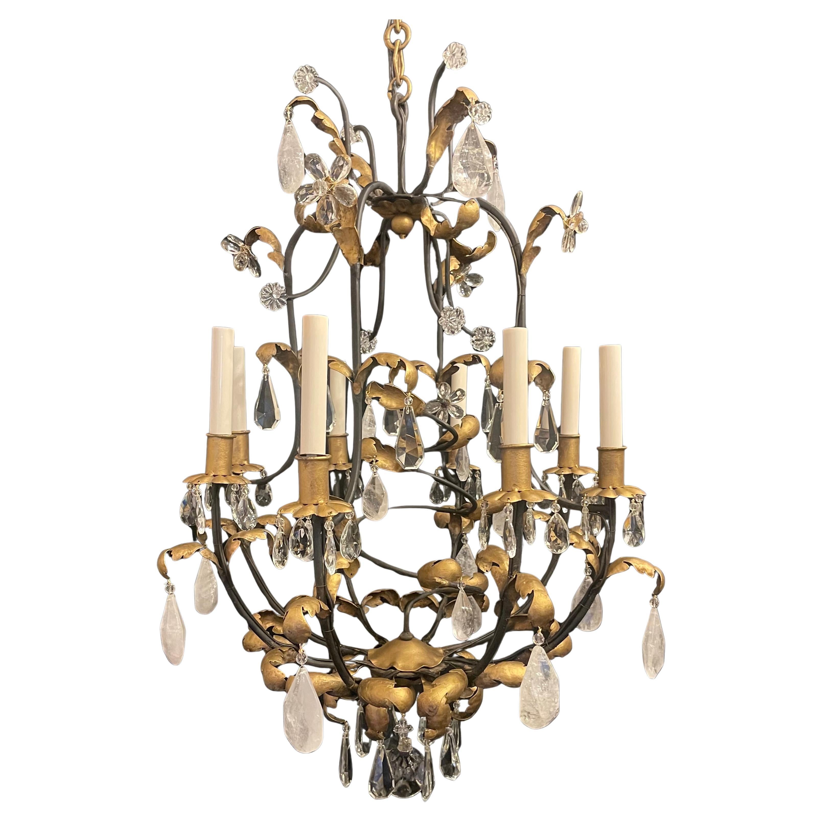 A Wonderful Baguès Style Gold Gilt On Iron Bird Cage Form With Alternating Rock Crystal & Crystals And Dressed With Flower From Leaves, This Chandelier Has 8 Candelabra Lights
Come Ready To Install With Chain And Canopy