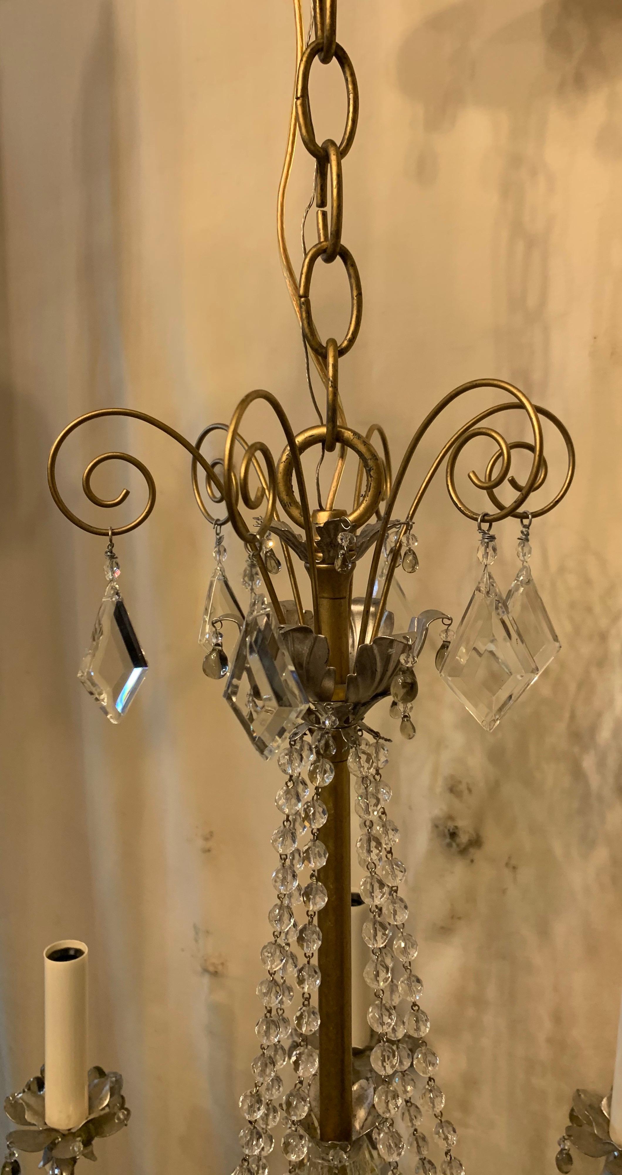 A wonderful Baguès style tole silver gold & gilt crystal drop beaded swag 7 candelabras light chandelier.