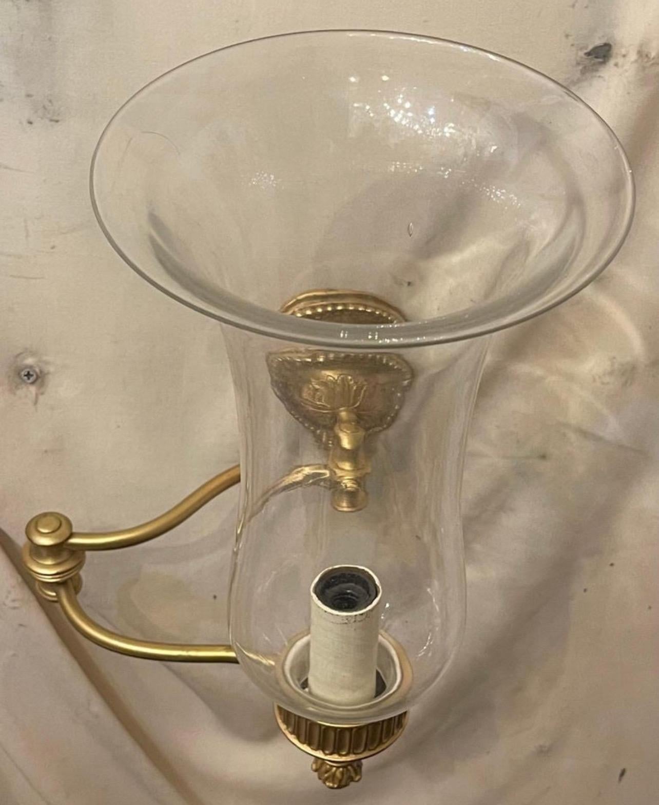Wonderful Baguès Vaughan Empire Bronze Swing Arm Hurricane Sconce Wall Lamp In Good Condition For Sale In Roslyn, NY