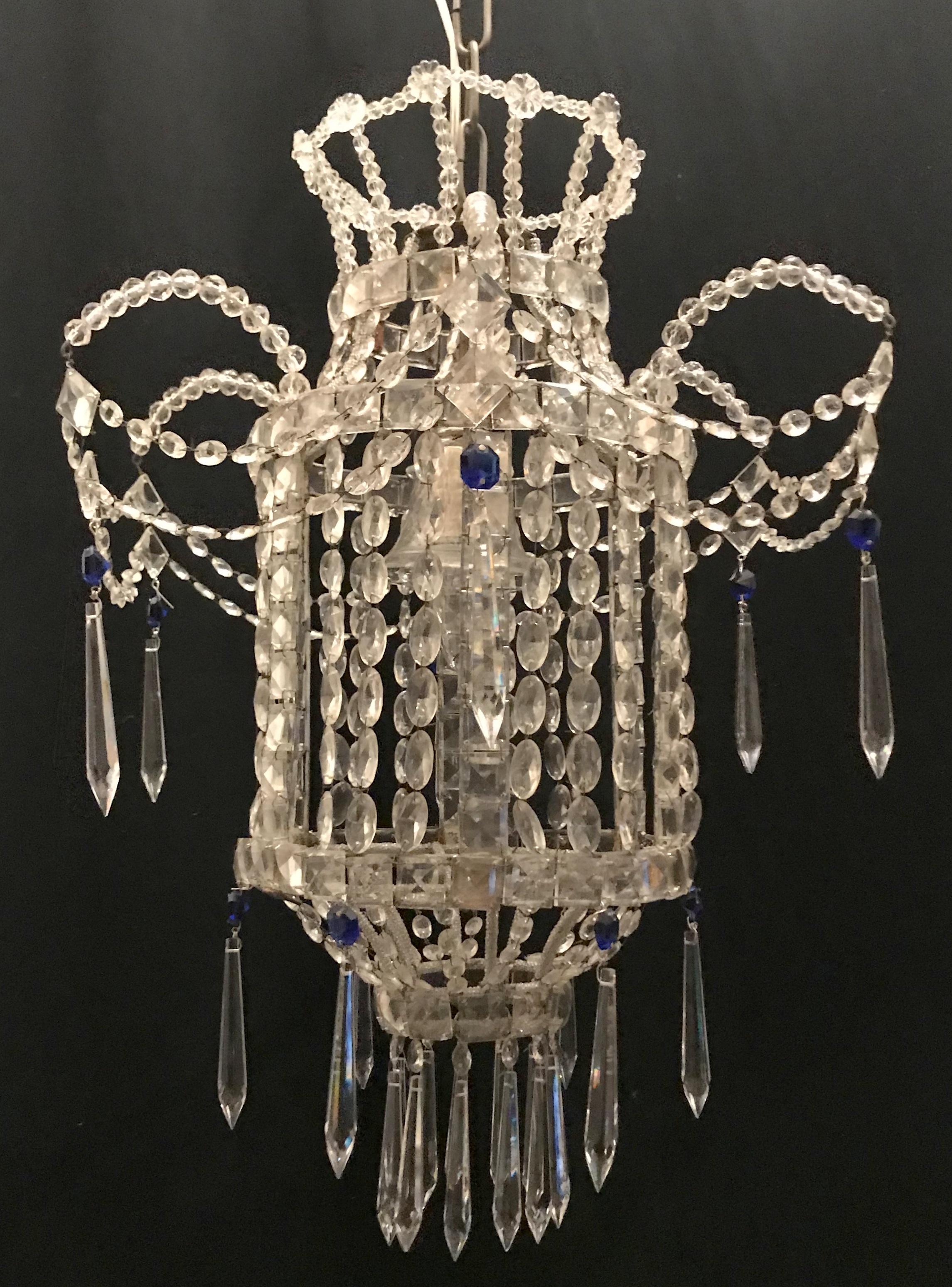 A wonderful beaded Italian Venetian pagoda form lantern with single Edison light fixture, chandelier crystal basket with draping and sapphire blue drops pendent.
Completely rewired for us and ready to install and enjoy.
Measures: 17
