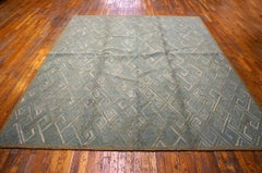 Maravillosa alfombra azul de diseño geométrico hecha a mano en algodón americano