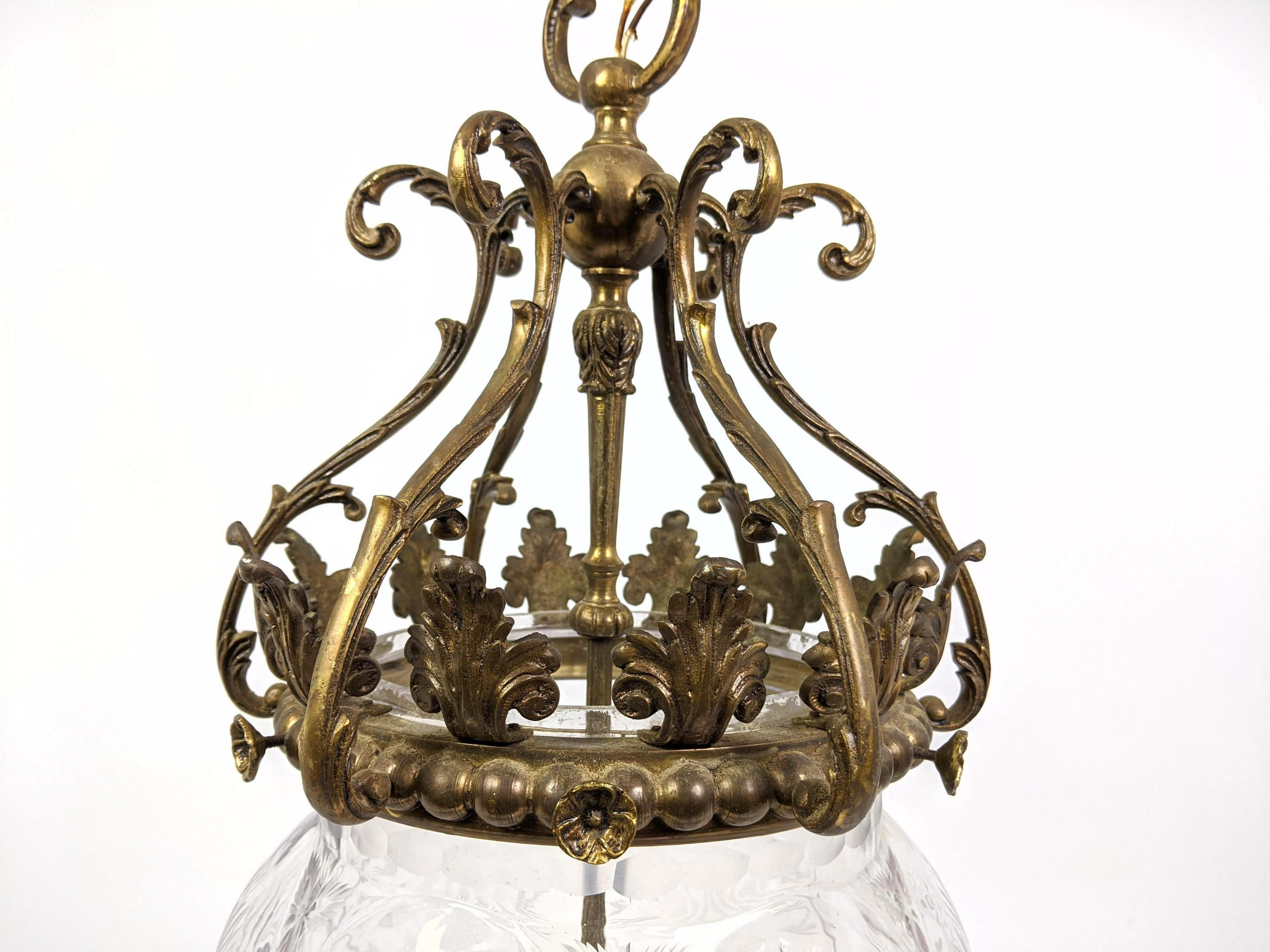 Wonderful bronze & cut crystal lantern hanging pendant light fixture engraved starburst pattern globe chandelier, rewired with 3 new candelabra sockets.

Dimensions: 27.5