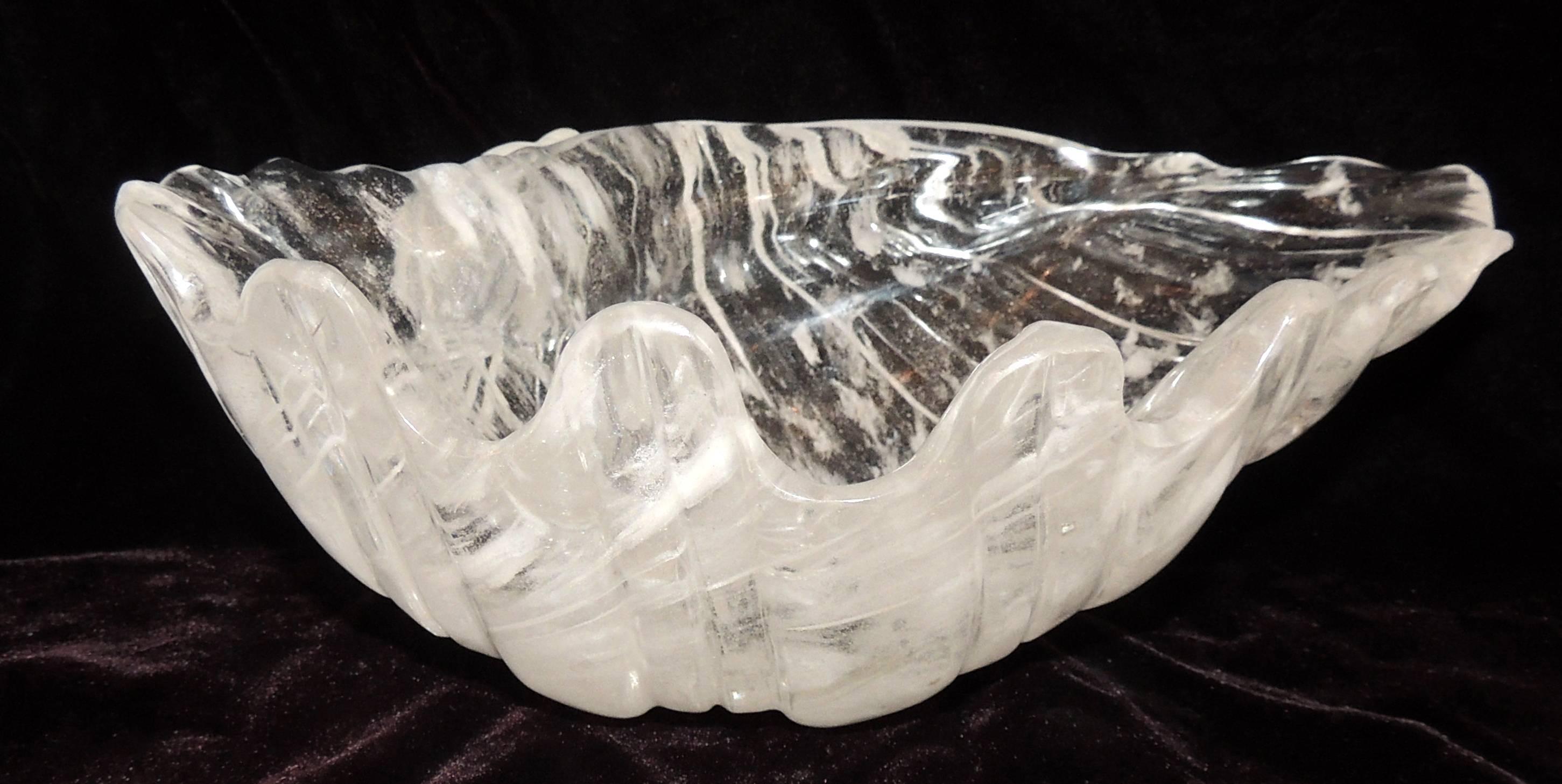 A wonderful carved cut rock crystal sea shell form sculpture bowl centerpiece in the Mid-Century Modern design.