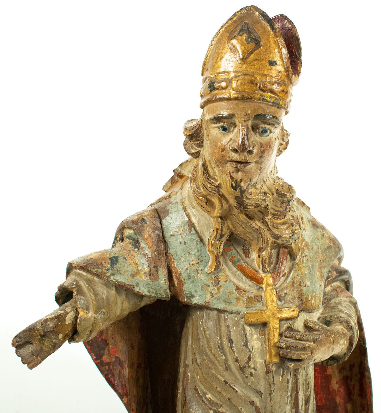 A wonderful original piece of the Renaissance Period - a carved wooden polychromed figure / statue of Saint Francis.

This piece was found in France but most probably originated in 16th century Italy.
The piece still displays the beautiful colours