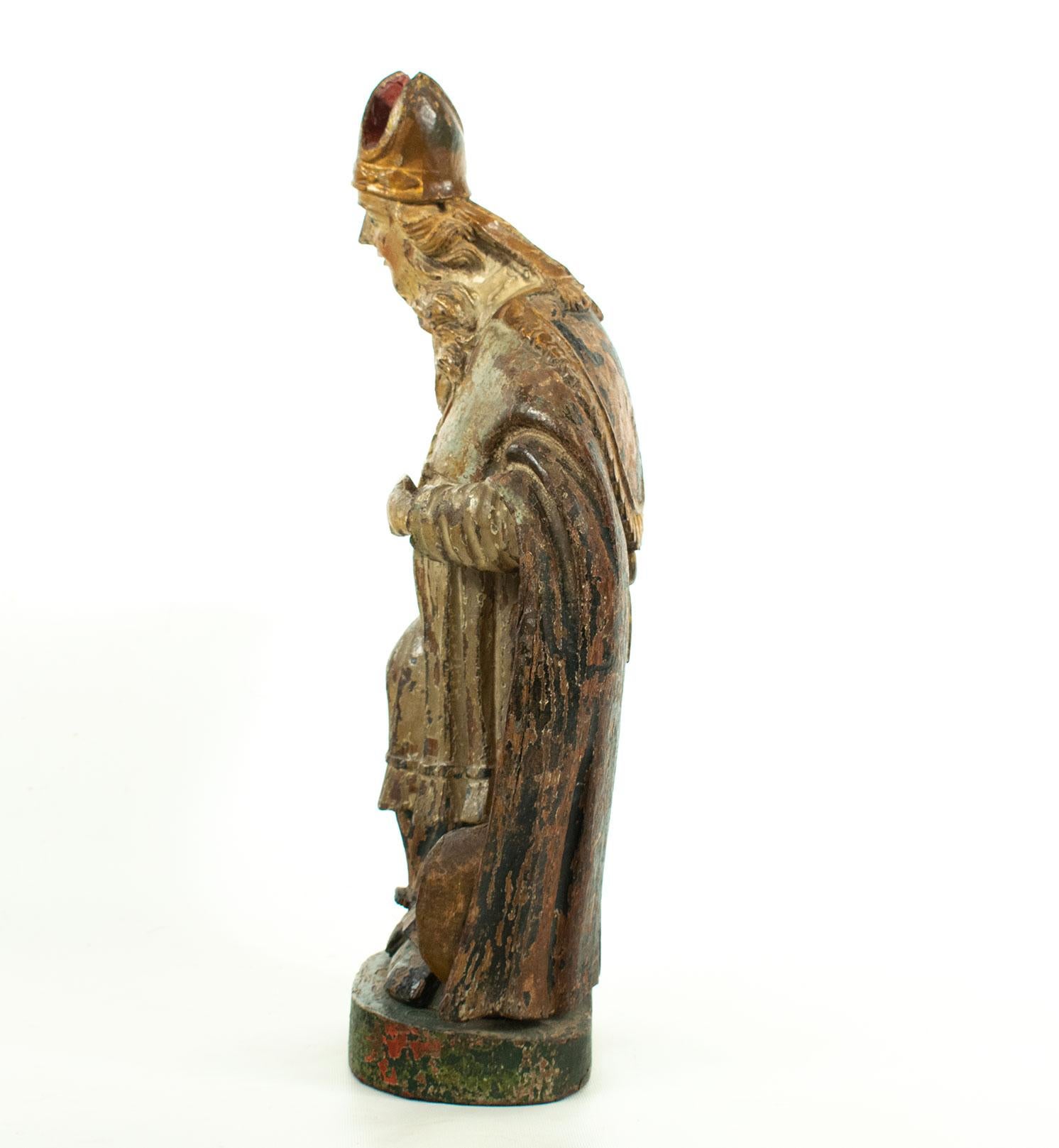 Renaissance 16th century Italian carved wooden polychromed statue of Saint Francis For Sale