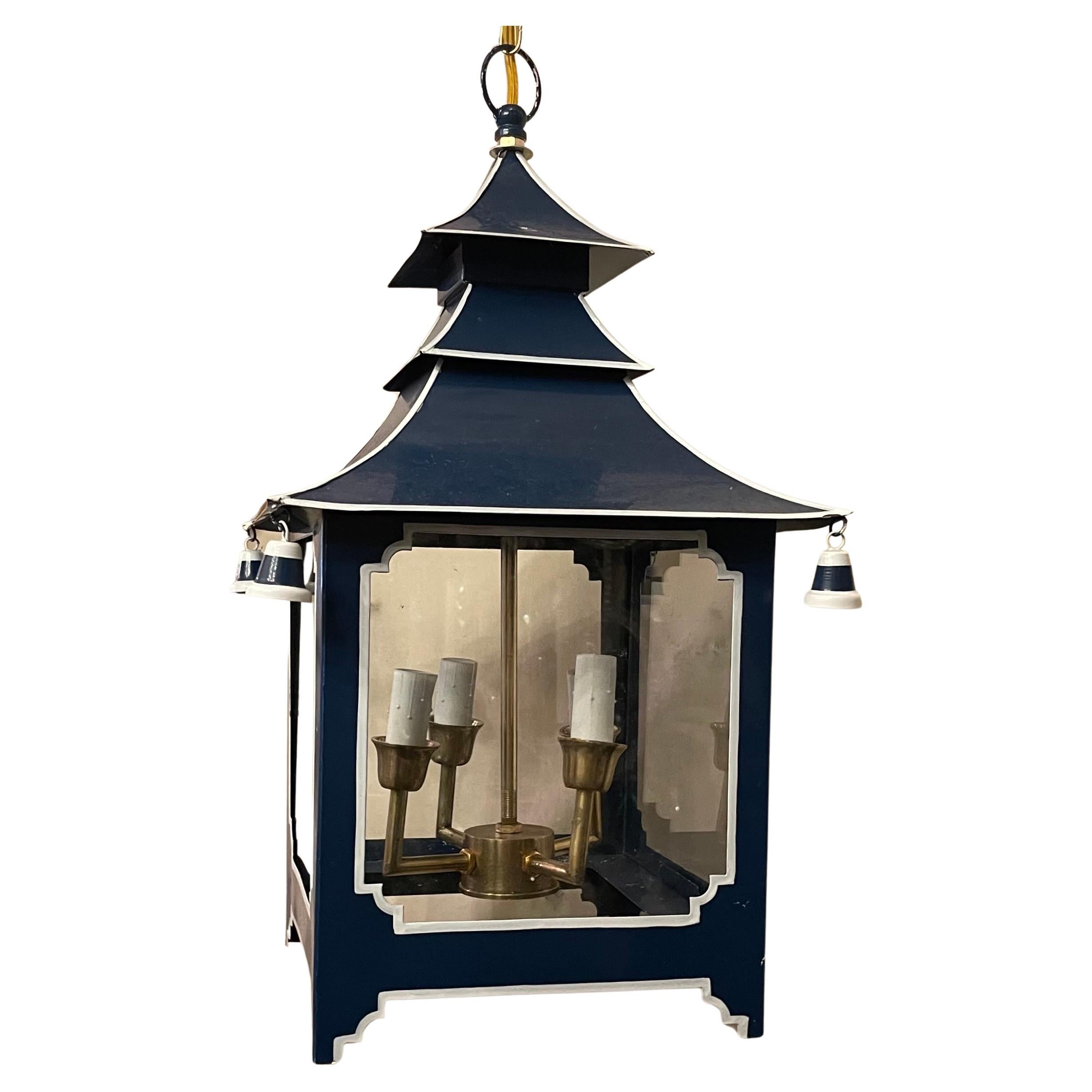 Wonderful chinoiserie pagoda square cobalt blue white contrast trim enameled paint and glass panel 4-light lantern fixture, completely rewired and ready to install with chain canopy and mounting hardware.
