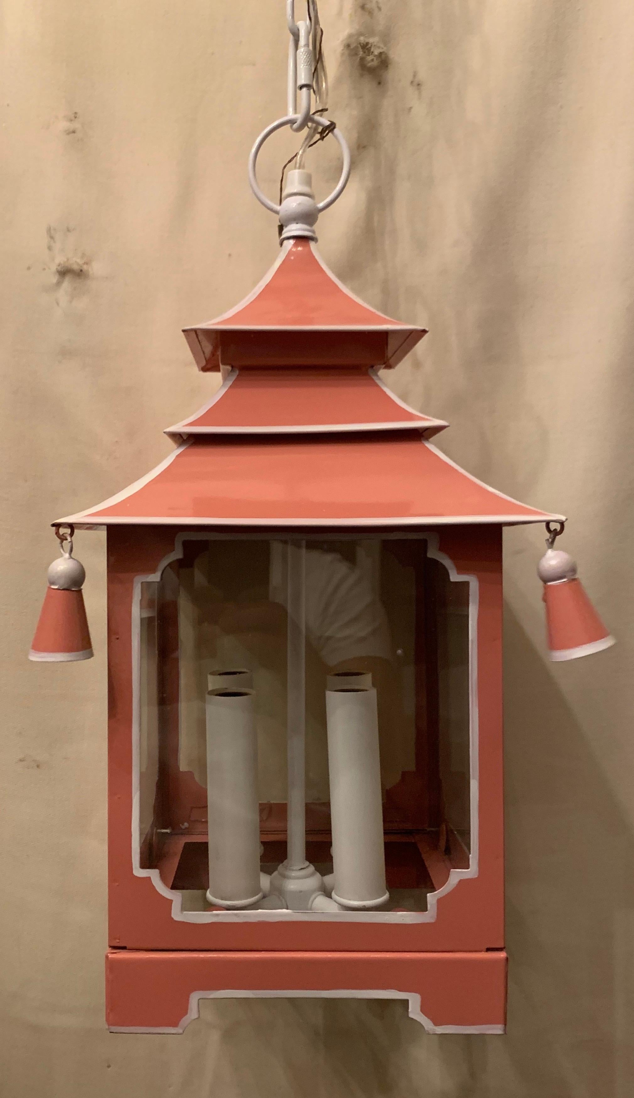 Wonderful chinoiserie pagoda square salmon pink and white contrast trim enameled paint and glass panel 4 light lantern fixture, completely rewired and ready to install with chain canopy and mounting hardware
details.
  
