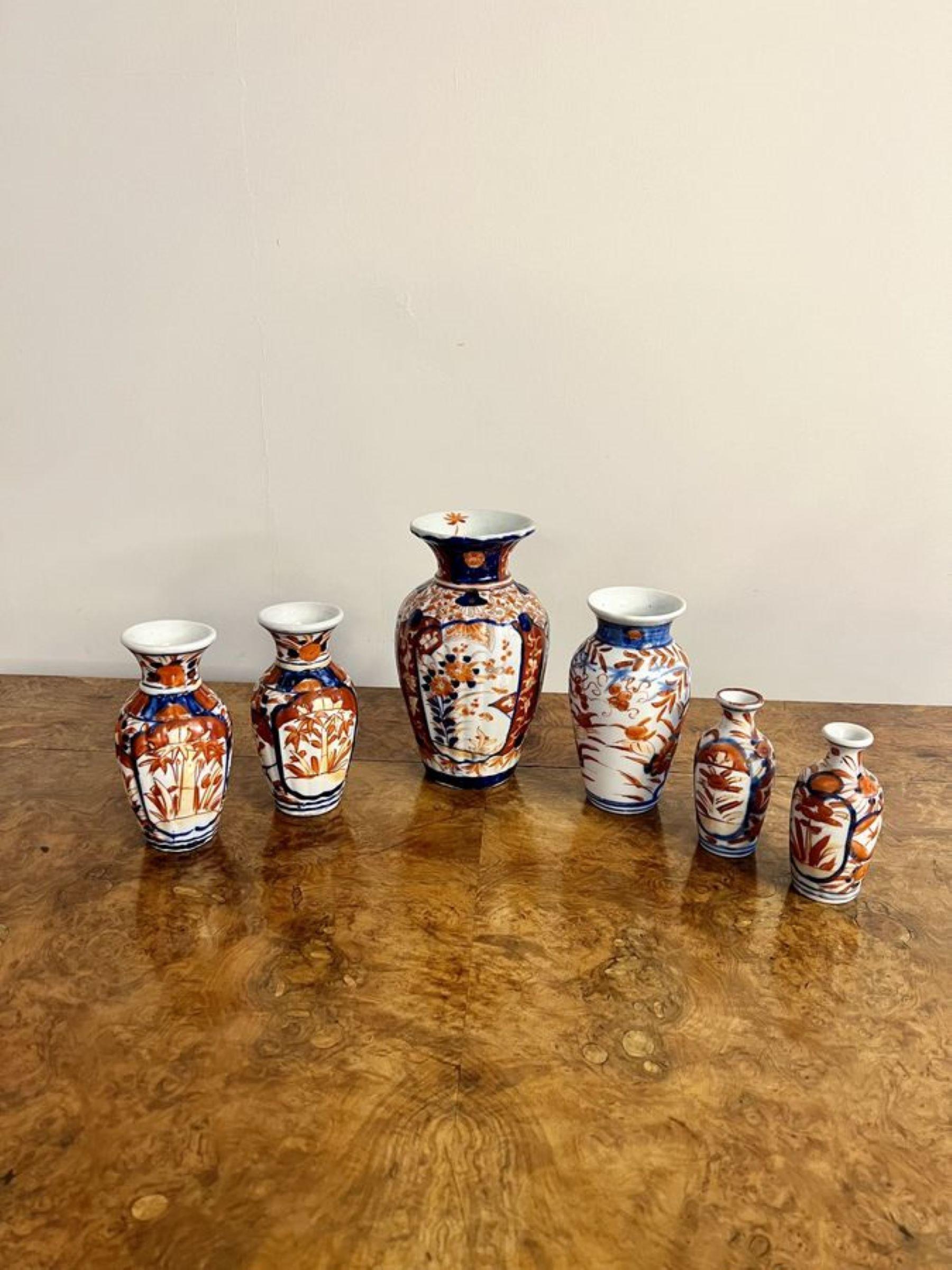 Wonderful collection of six small antique Japanese imari vases having a wonderful collection of various antique Japanese imari vases, hand painted in wonderful red, blue and white colours decorated with flowers, leaves and scrolls. 

D. 1900
