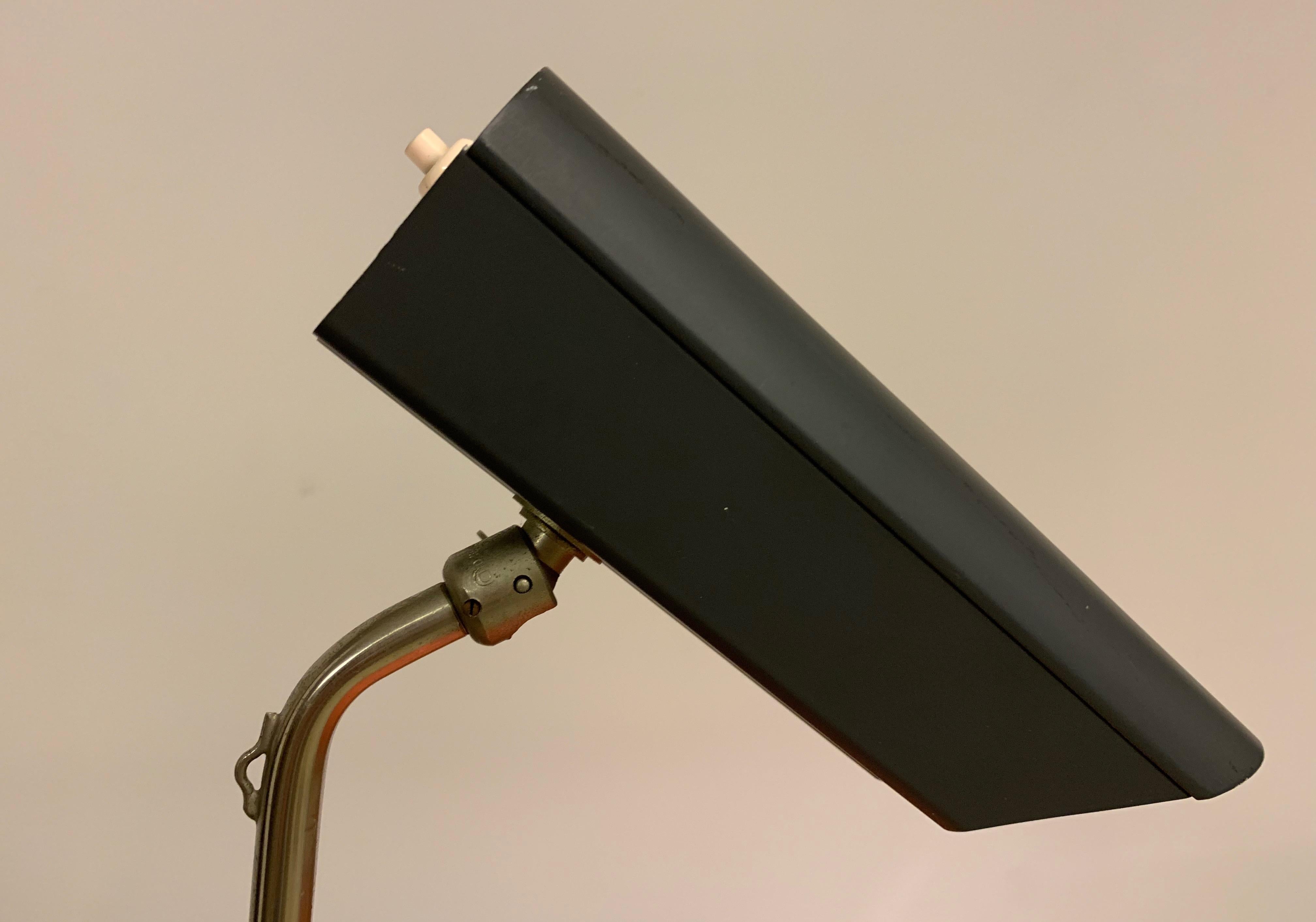 Nickel-plated and black lacquered metal spotlight with grey lacquered metal shade. Manufactured by Lyfa. Can be adjusted by the counterweight.