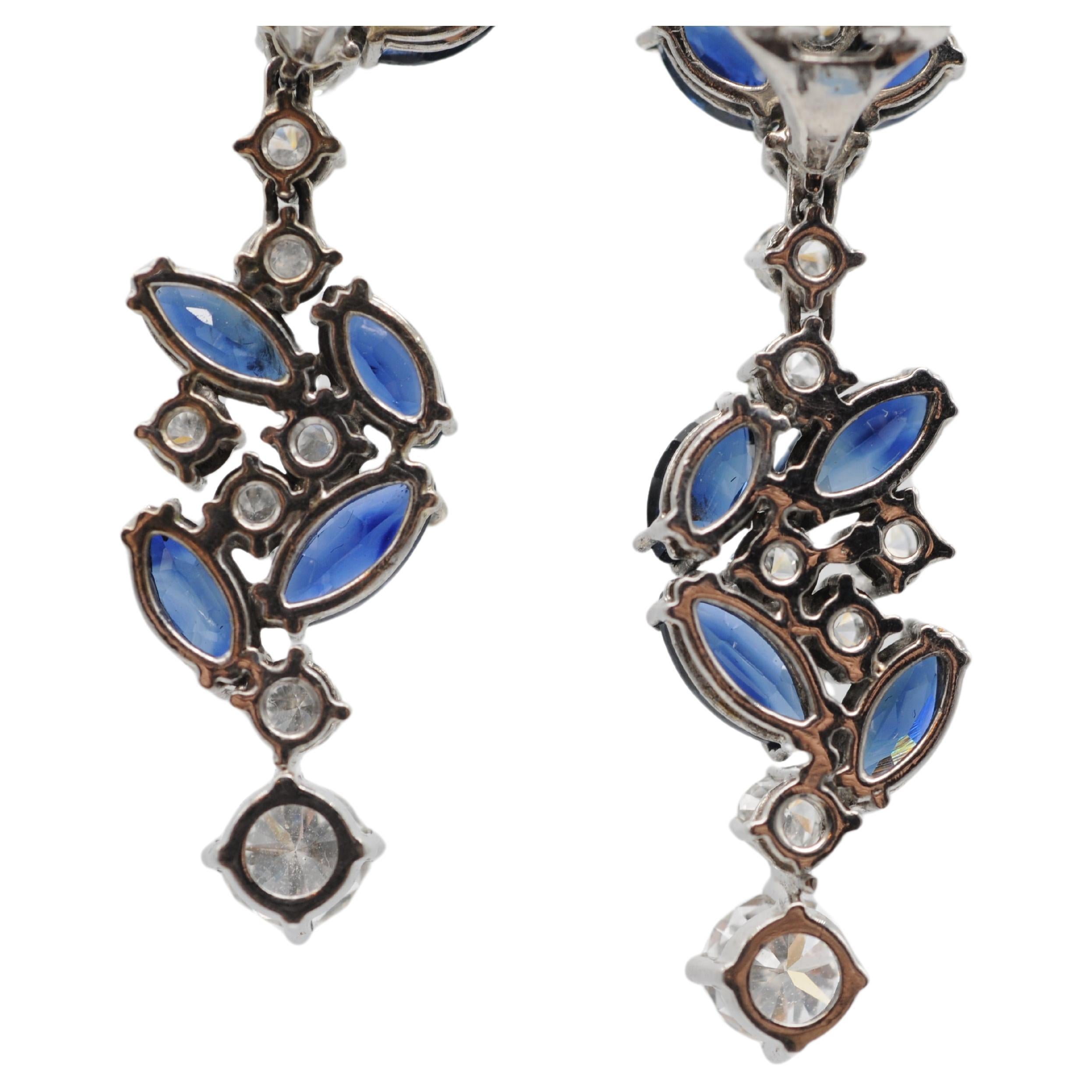 Wonderful earrings in 18k white gold with diamonds and sapphires. For Sale 10