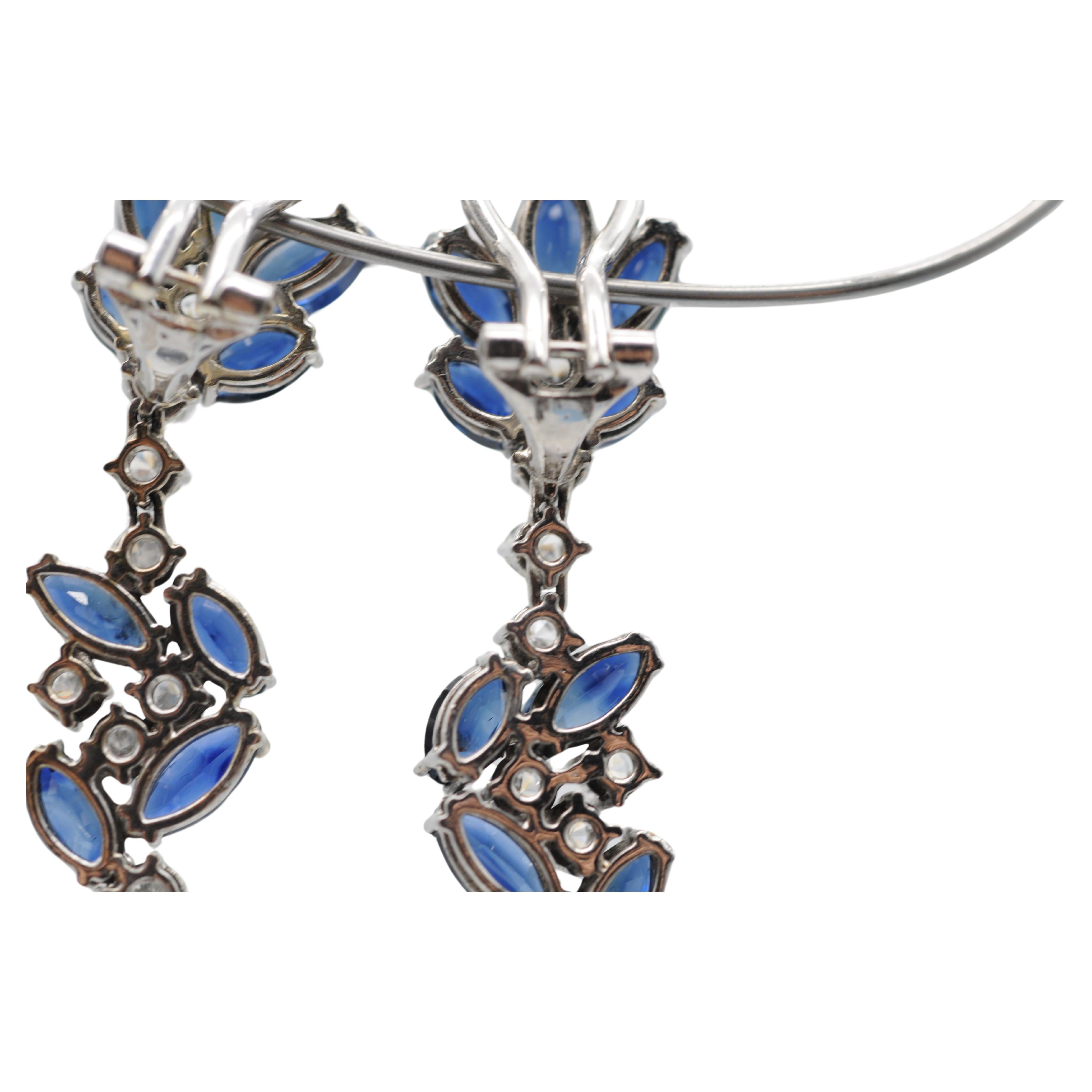 Wonderful earrings in 18k white gold with diamonds and sapphires. For Sale 12