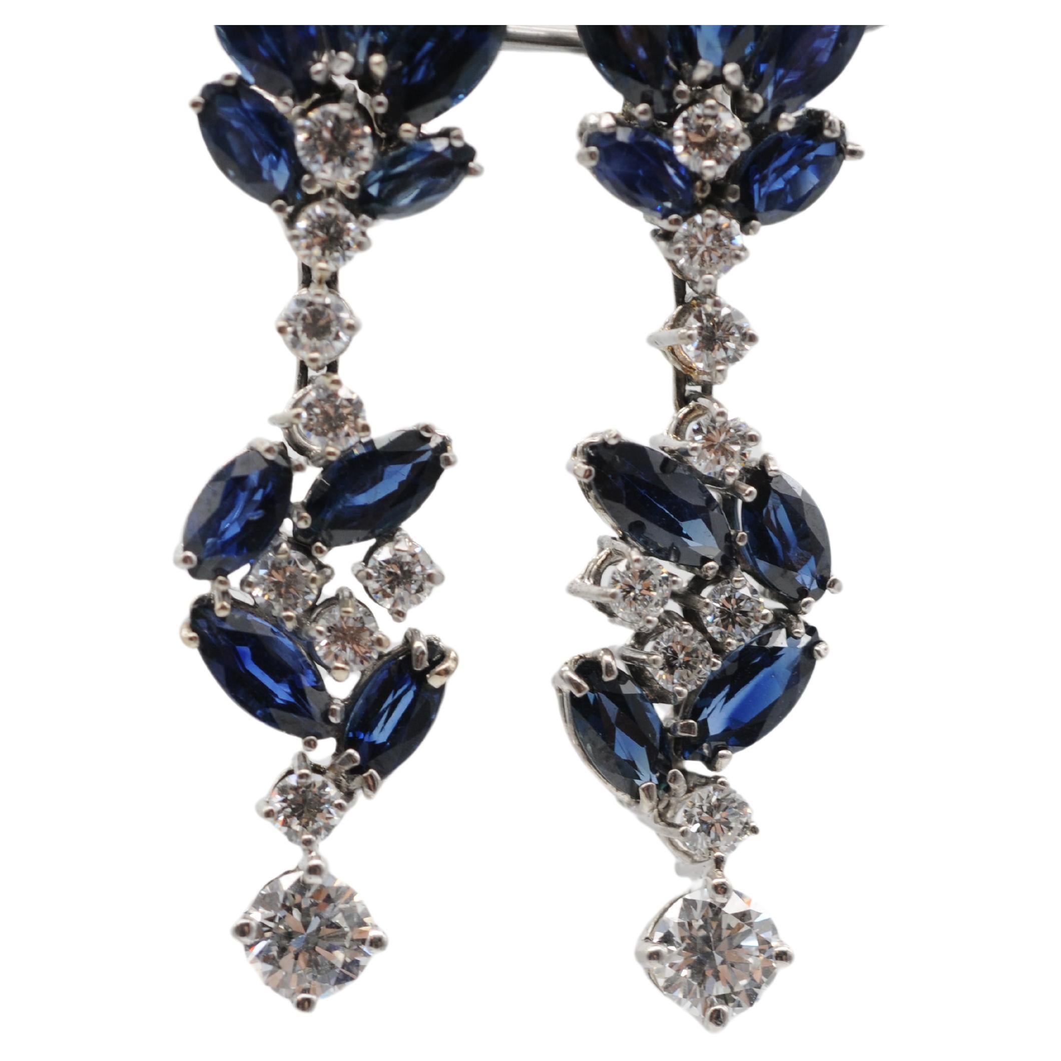 Wonderful earrings in 18k white gold with diamonds and sapphires. For Sale