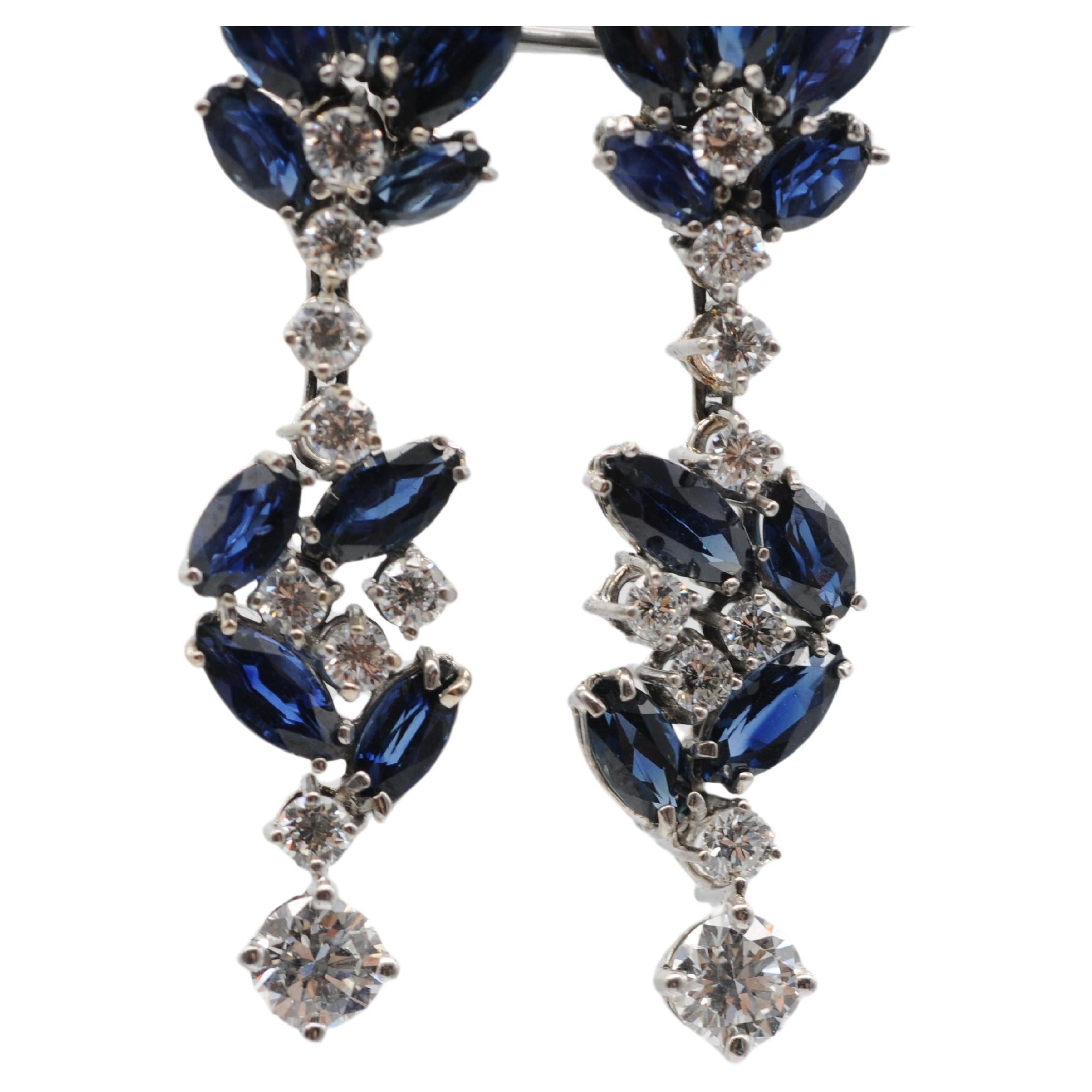 Maravillosos pendientes de oro blanco de 18 quilates con diamantes y zafiros. en venta