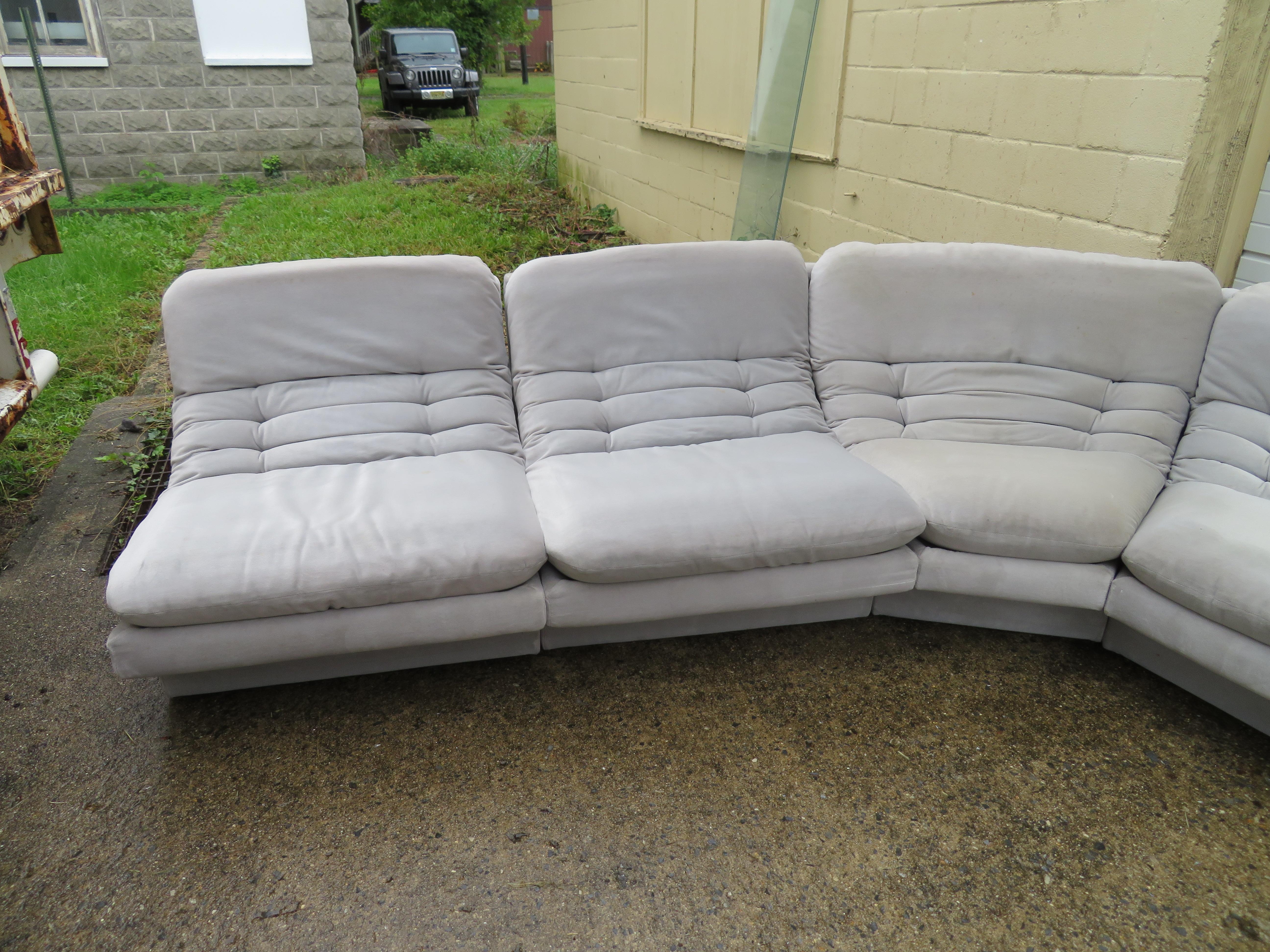 Wonderful eight-piece sectional sofa. This set will need to be re-upholstered but that's what you designers are looking for anyway-right? We have several other sectionals in this style listed in our other 1stdibs offerings. Each of the straight