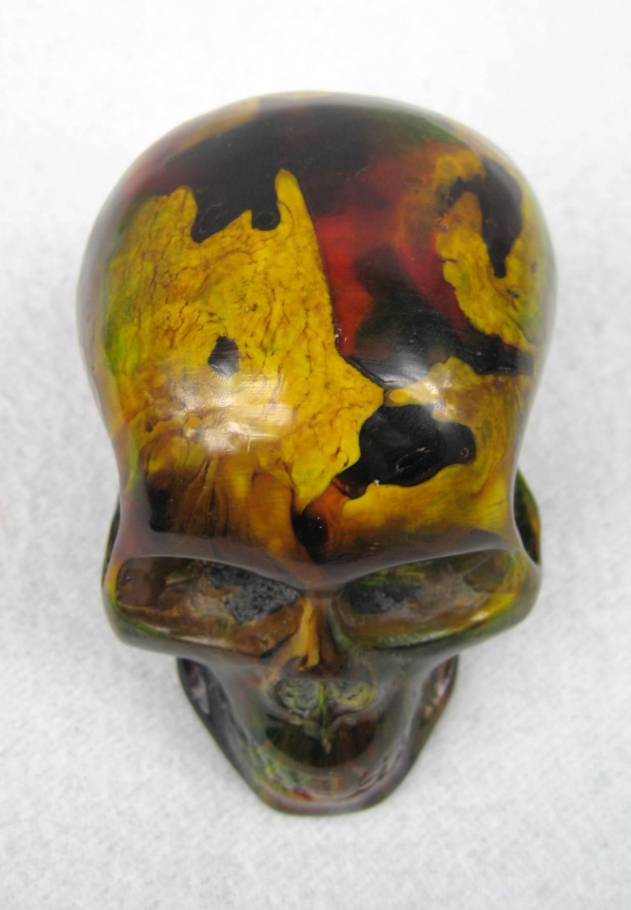 Wonderful color on this end of day bakelite Catalin skull. A show stopper! Vibrant yellows, greens, and more fabulous colors. A great addition to your decor. Please be sure to check our storefront for more wonderful decorating pieces that range from