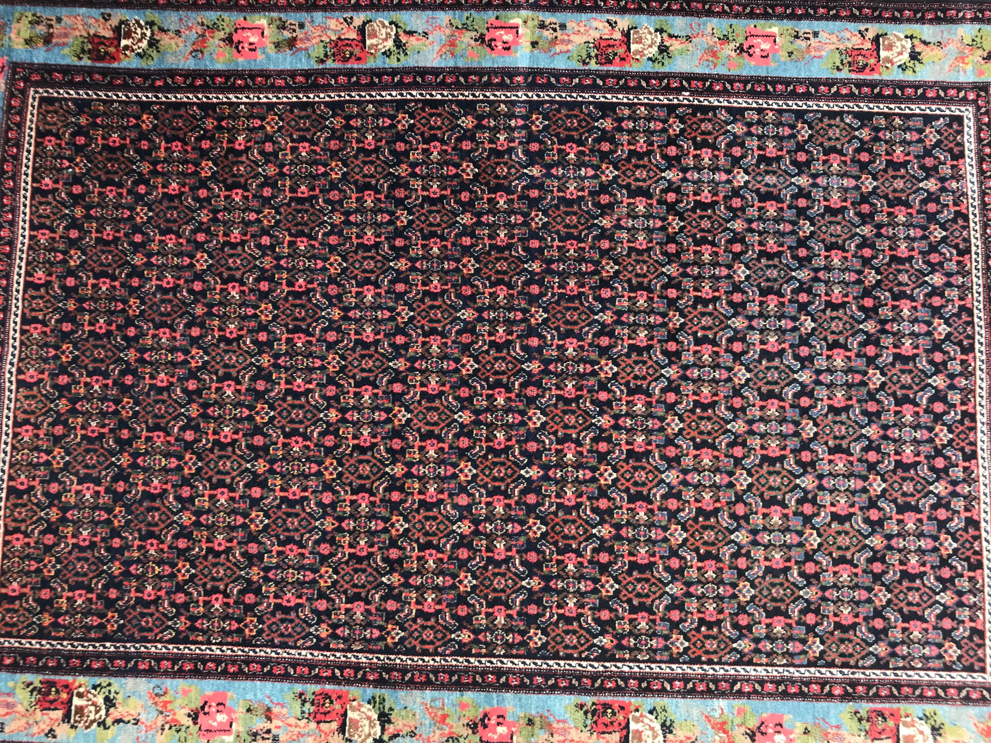 Beautiful early 20th century rug from Kurdistan, with nice Herati design, lovely French Savonnerie style borders, with natural with dark blue field, pink, red, blue, green and brown, finely hand knotted with wool velvet on cotton foundation.