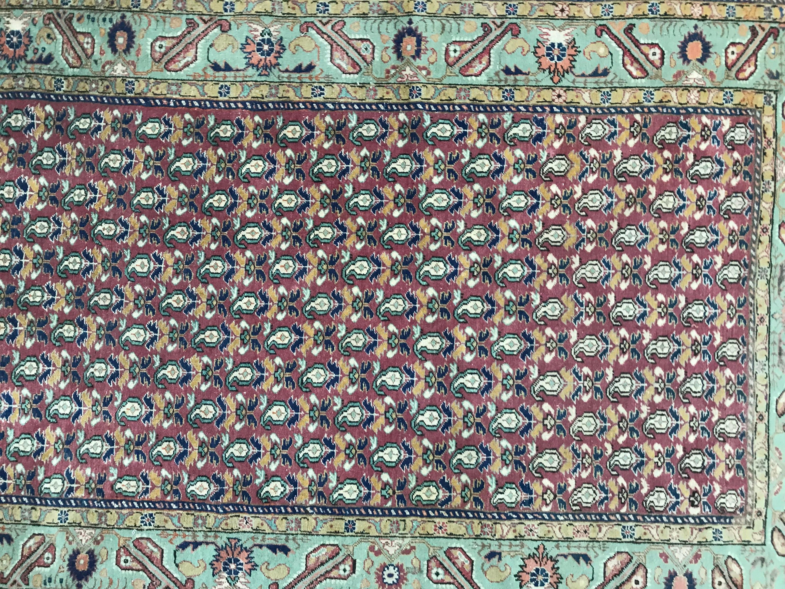 Beautiful fine Turkish Sivas rug with decorative design and beautiful colors with yellow, blue, green, brown and purple, entirely and finely hand knotted with wool velvet on cotton foundations.